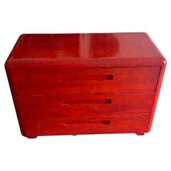 Commode rouge en contreplaqué moulé du milieu du siècle dernier par Paul Goodman pour plymold