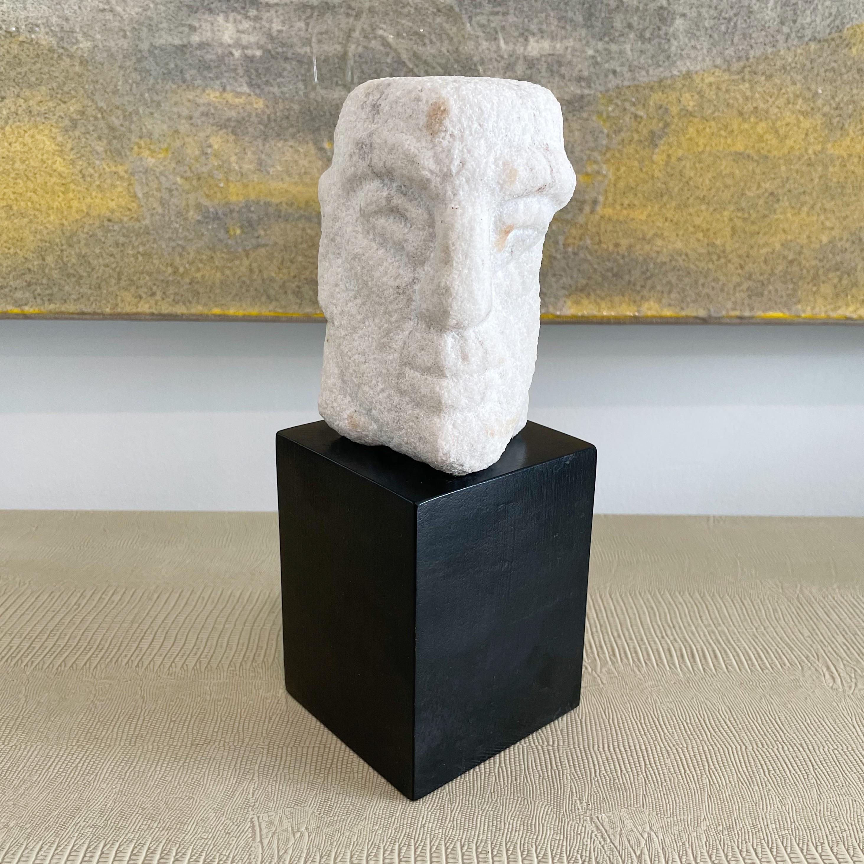 Vintage hand carved solid white marble sculpture of a head on black lacquered plinth wood base. From a Palm Beach Estate. Signed Tarr on reverse.