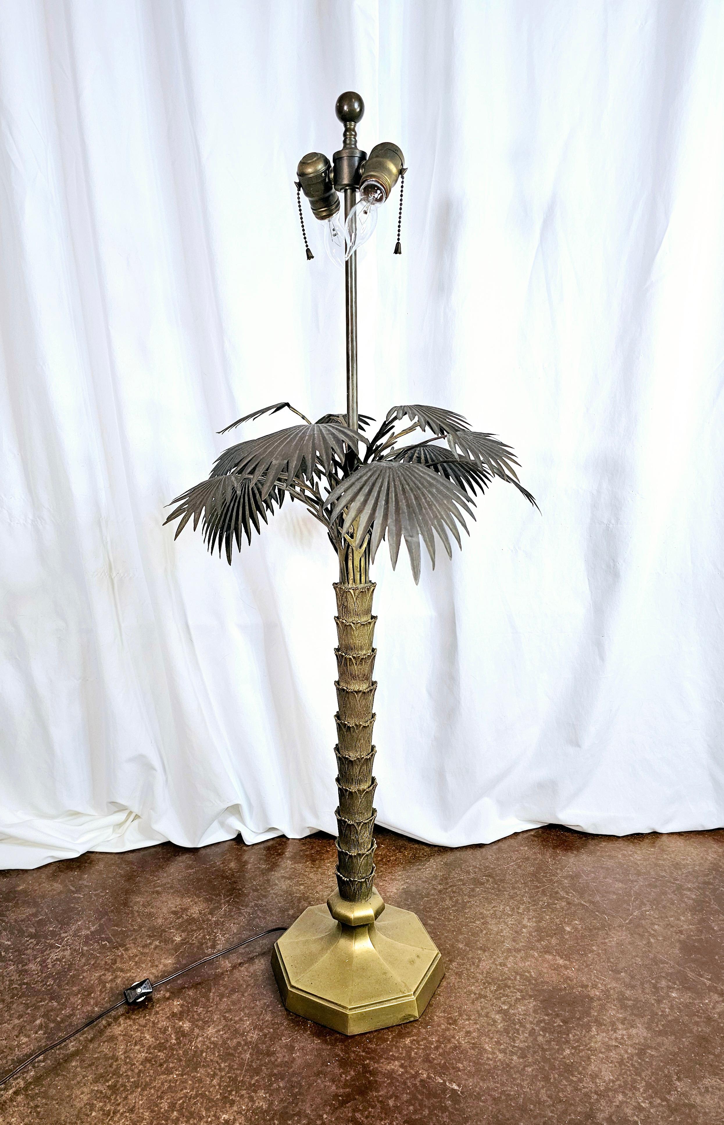 Mid century modern.
Brass palm tree frond table lamp by Chapman.
Classic figurative styling. 
Intricate details. 
3 lighting settings, pictured.
Fully functional. 

This piece is almost entirely brass.
Very solid with good weight. 
Could support a