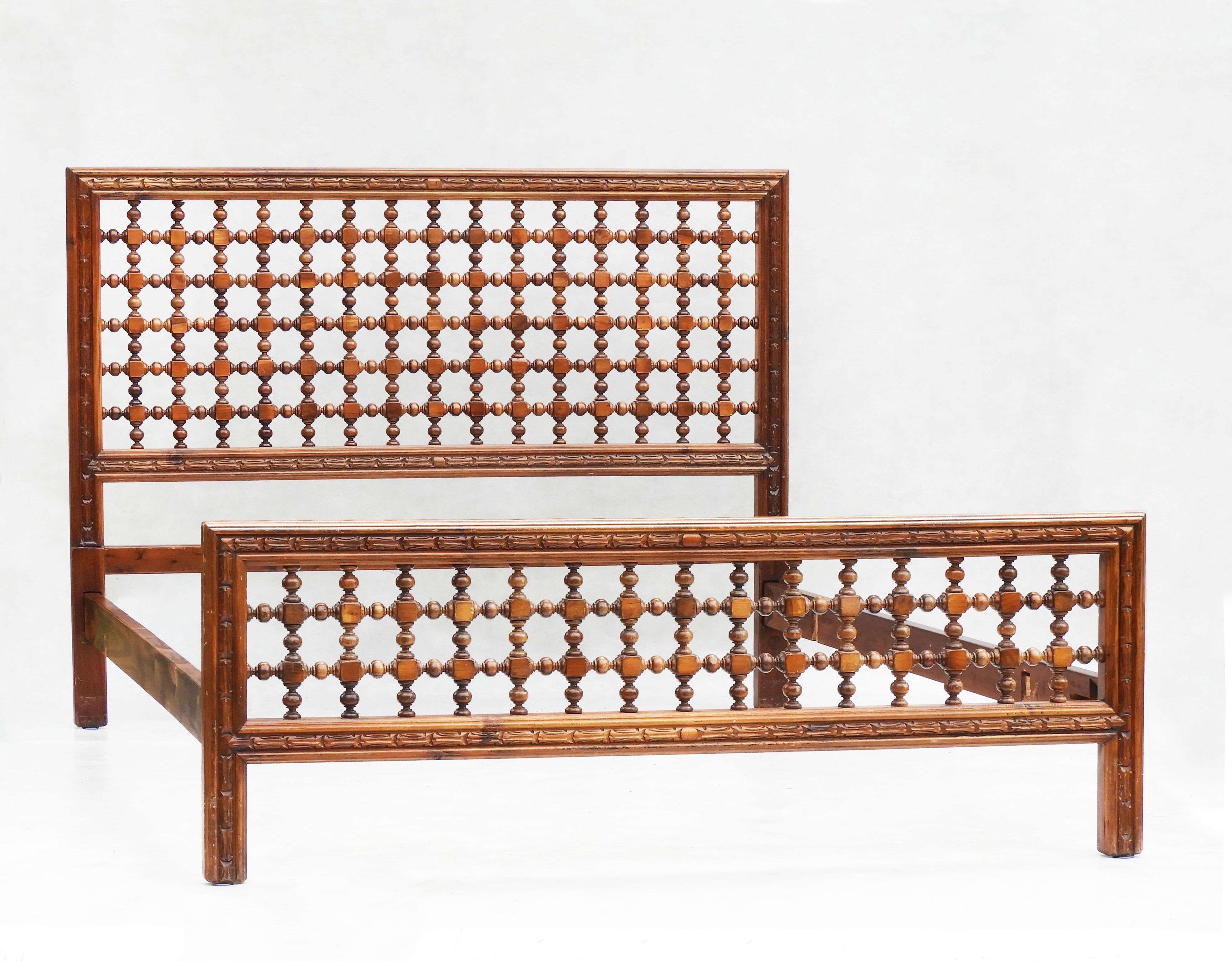Gorgeous mid-century bobbin wood bed.  Moorish influenced geometric design, c1950s Spain.  Artisan made in turned and hand-carved fruitwood.  In great vintage condition with good patina, solid and sound with only minor signs of use.  This bed will