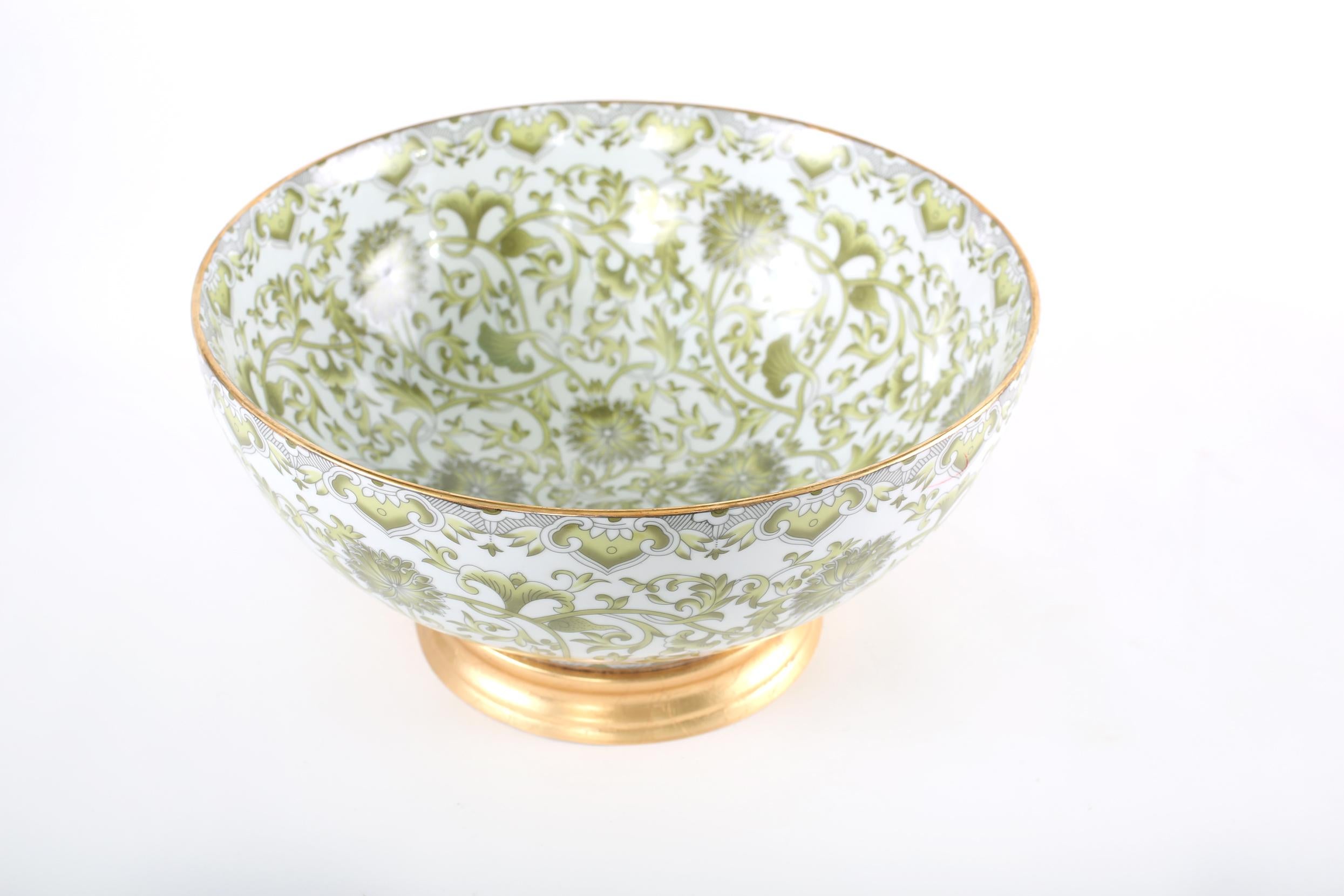 Mid-Century Modern gilt gold base porcelain decorative centerpiece / punch bowl. The centerpiece bowl is in great condition. Minor wear consistent with age / use. The bowl stand about 14 inches x 7.2 inches including the base.