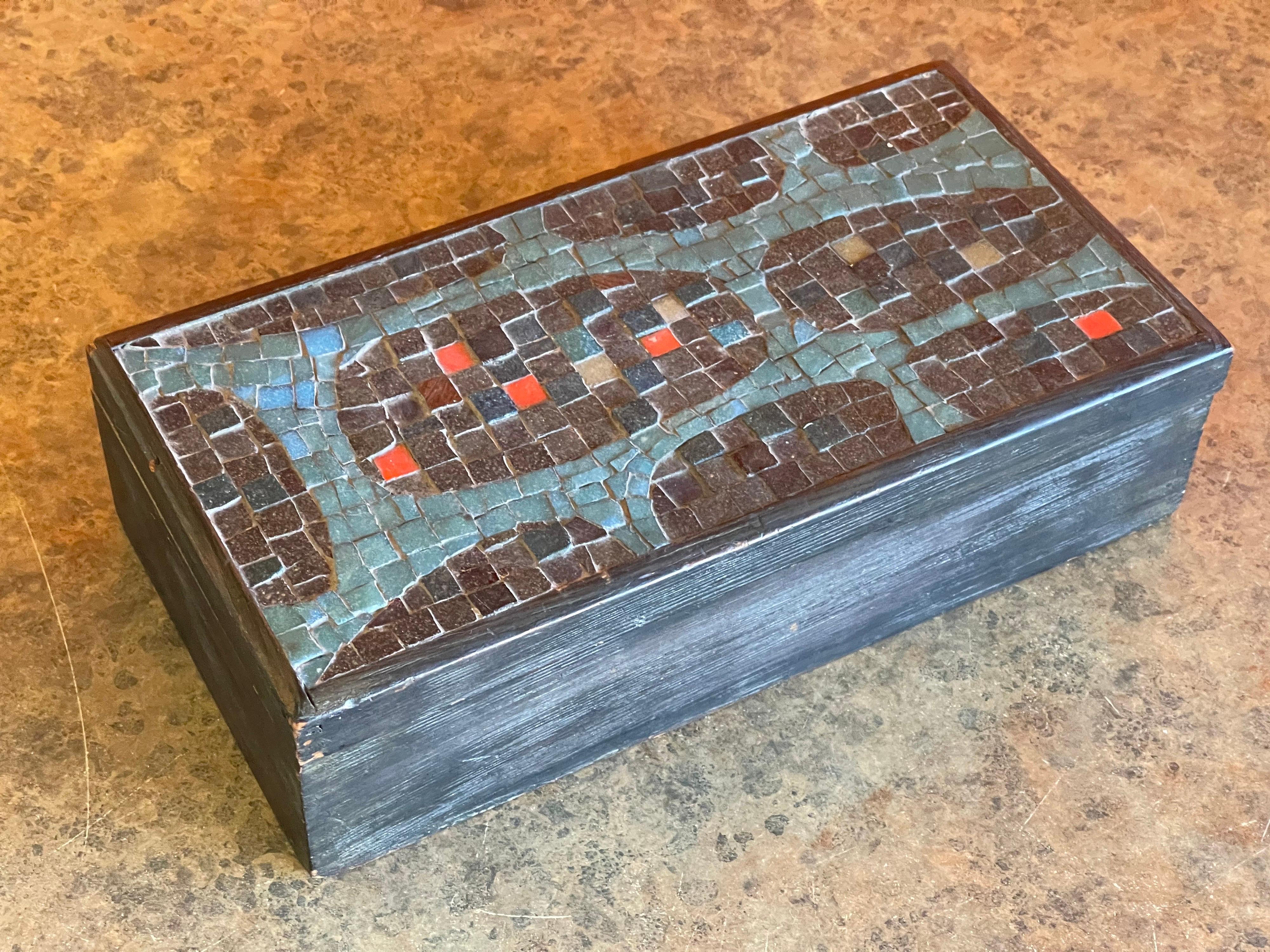 A very cool midcentury mosaic and wood lidded box, circa 1960s. The piece is in very good vintage condition with some wear and patina. #1444.
