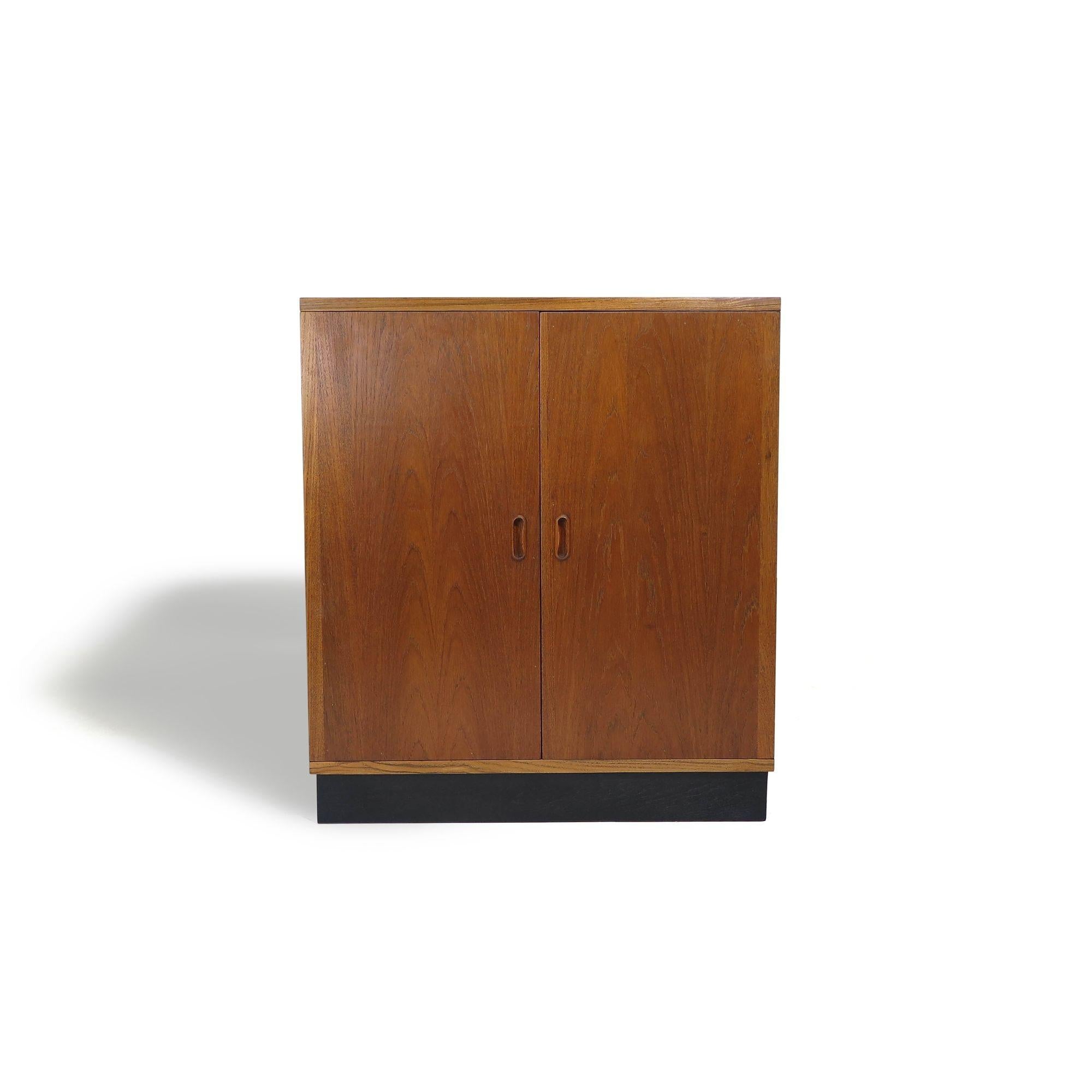 Mid century teak cabinet in manner of Hans Olsen with series of interior gradient colored drawers.

Measurements
W 32