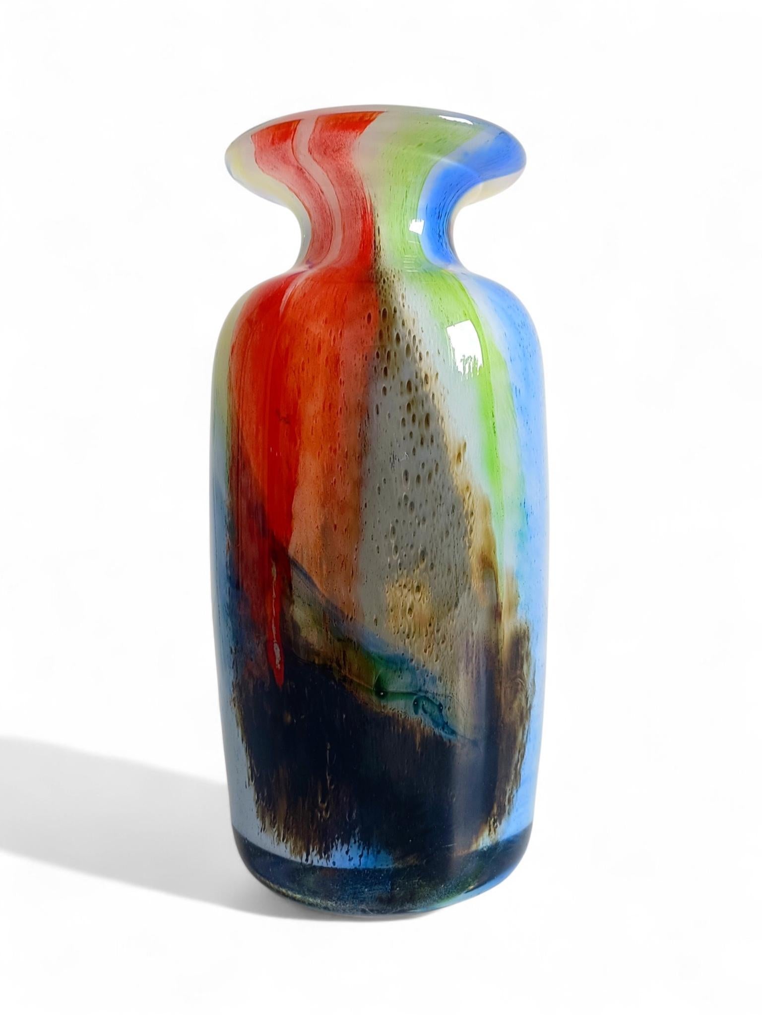 Murano Art Glass Vase — Abstract Expressionist Style, Italy, 1950s–1960s

An outstanding hand-blown Murano art glass vase featuring a dynamic, expressionist pattern of molten red, green, blue, and brown strokes over a white background — evoking the
