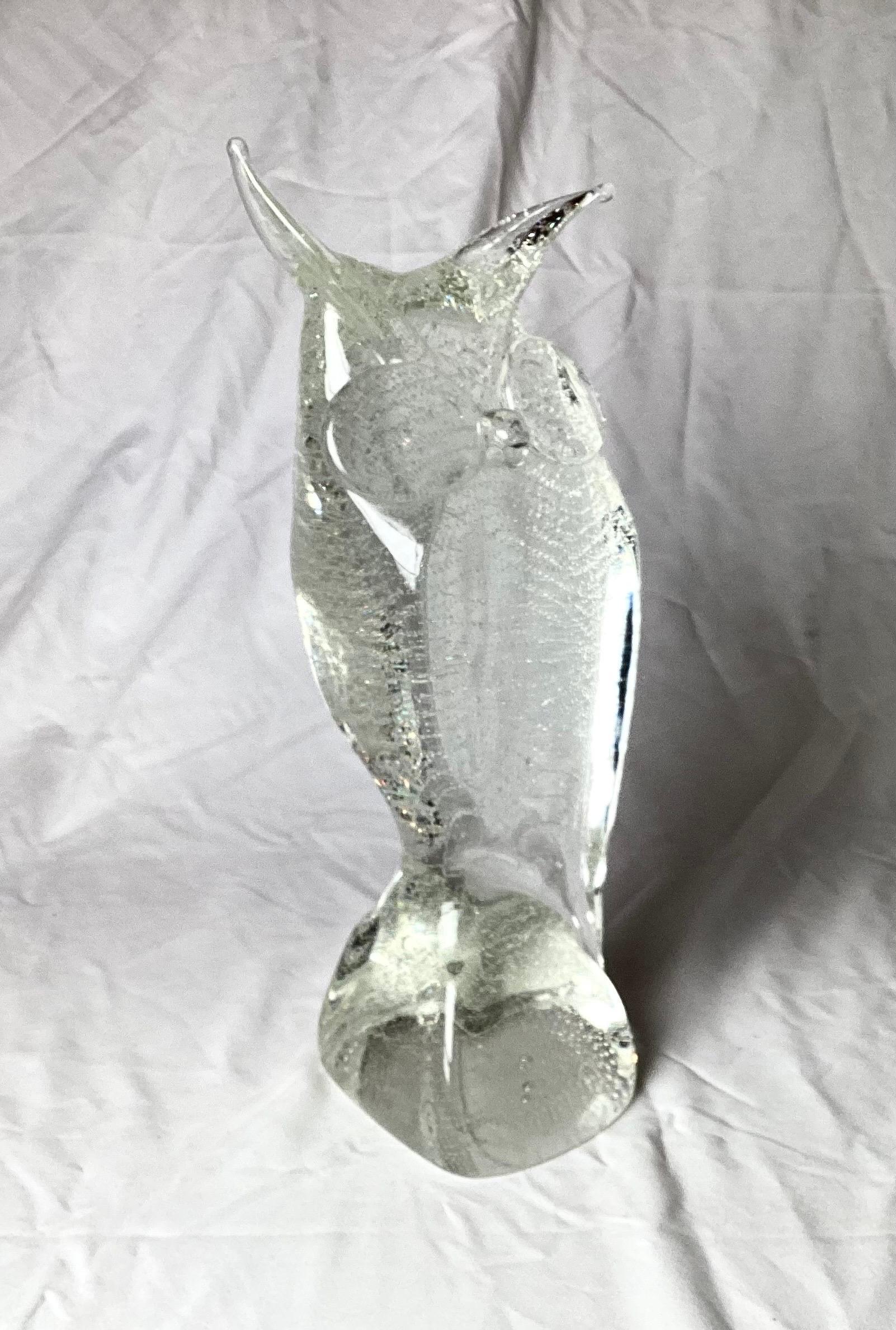 A Beautiful heavy crystal stylized owl sculpture with floating bubbles throughout. Mid 20th century Murano glass, Italy, with striking eyes and pointed earls. 14 inches tall.