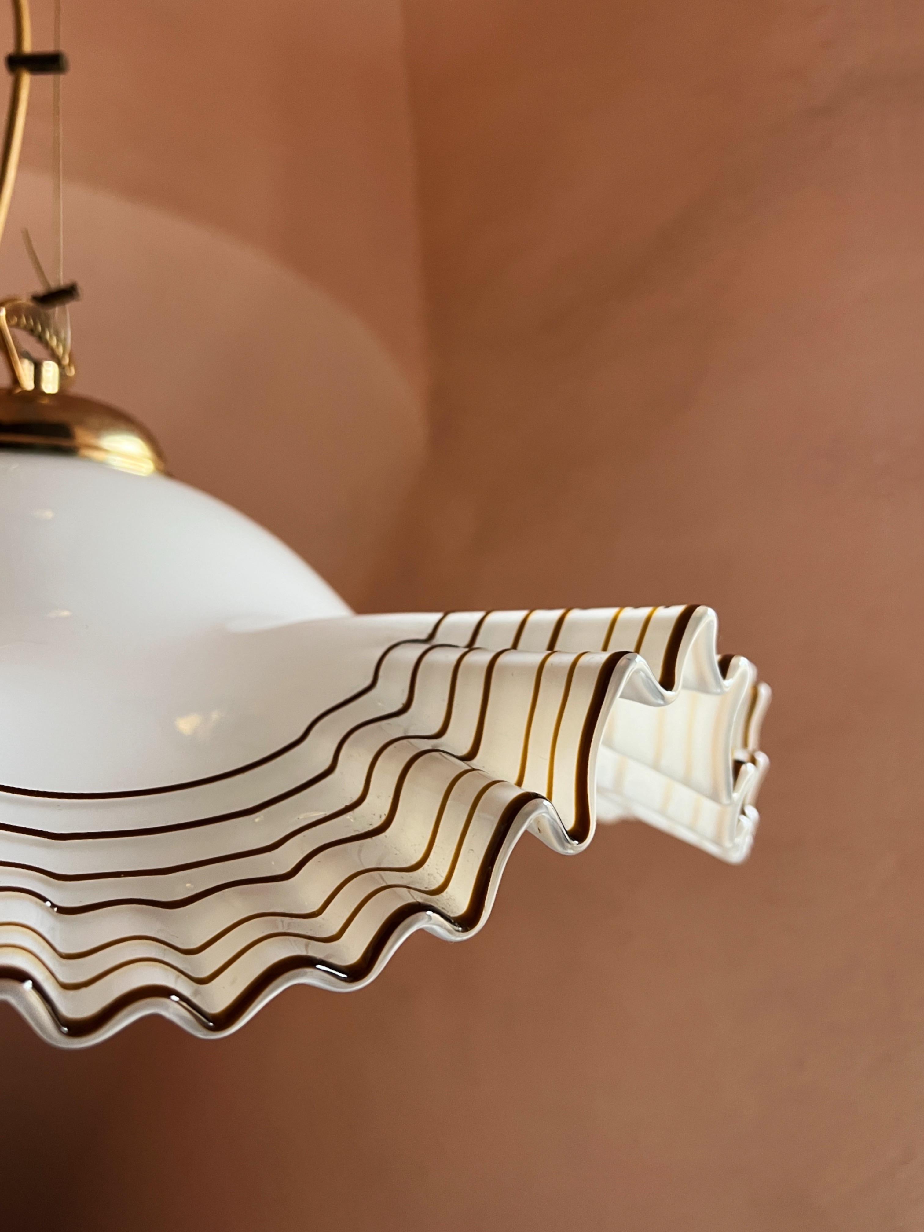Ceiling light by Murano De Majo, Italy 1970s. Beyond beautiful with its brown coloured trim. Wire is adjustable to ceiling. Height with wire is 150 cm/59 inches.