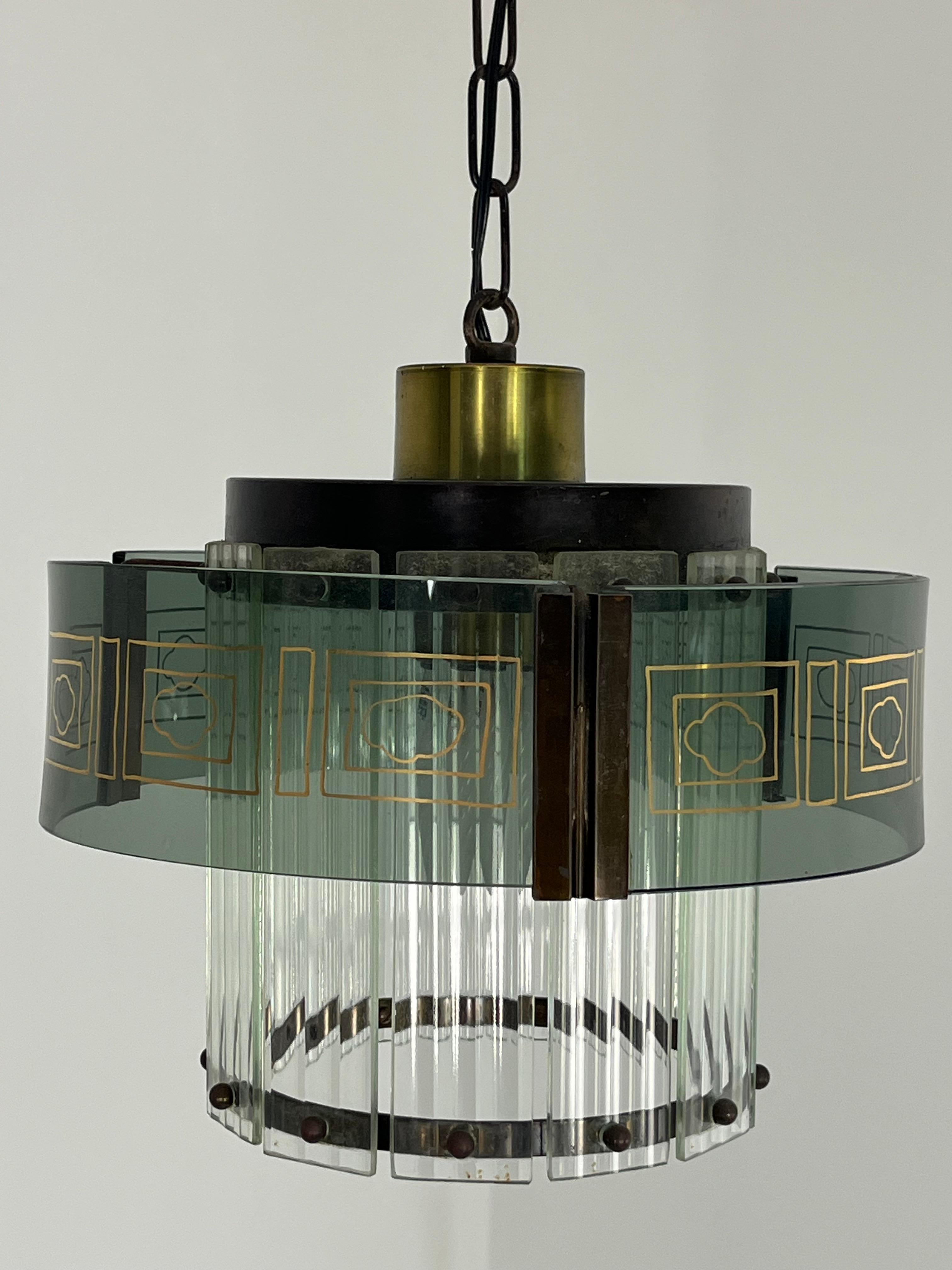 Lampadario Art Deco in vetro di Murano, 1950
Struttura in ottone e metallo verniciato.
Condit e in buone condizioni.
