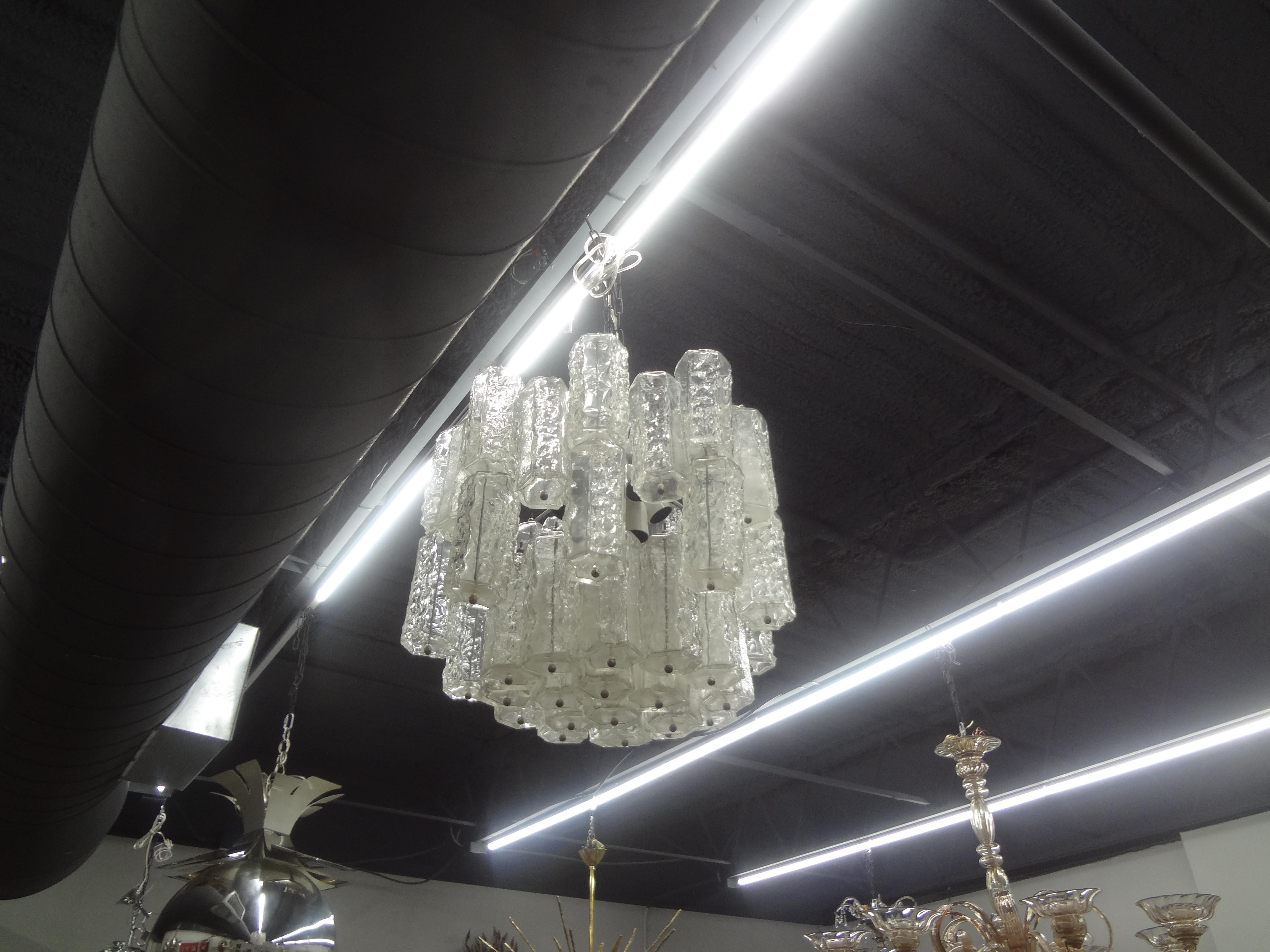 Midcentury Murano Glass Chandelier.
This lovely Hollywood Regency mid century Murano glass chandelier has been newly wired with new sockets for the U.S. market.
Our Toni Zuccheri for Venini style chandelier is perfect for a powder room, dressing