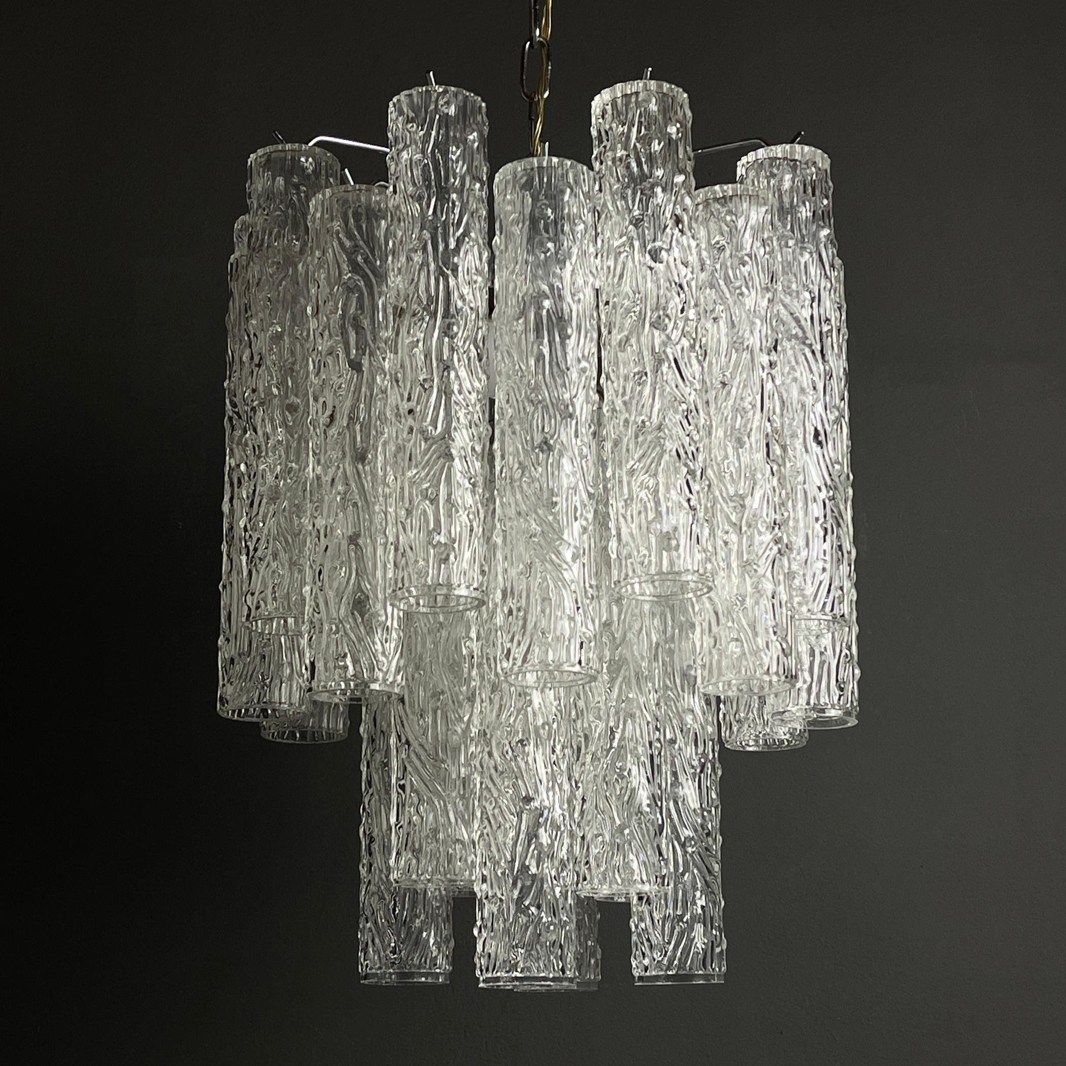 The elegant Murano glass chandelier made in Italy in the 60s. Designer Toni Zuccheri for Venini & Co. Venini & Co. played a leading role in the revival of Italy’s high-end glass industry, pairing innovative modernist designers with the skilled