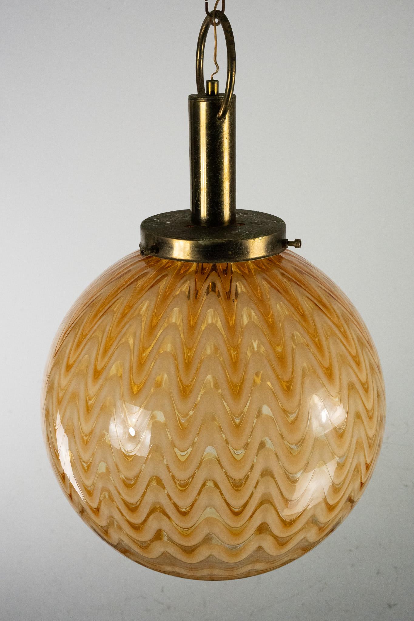 Metal Mid-Century Murano glass sphere chandelier in the style of Venini. Italy 1970s For Sale