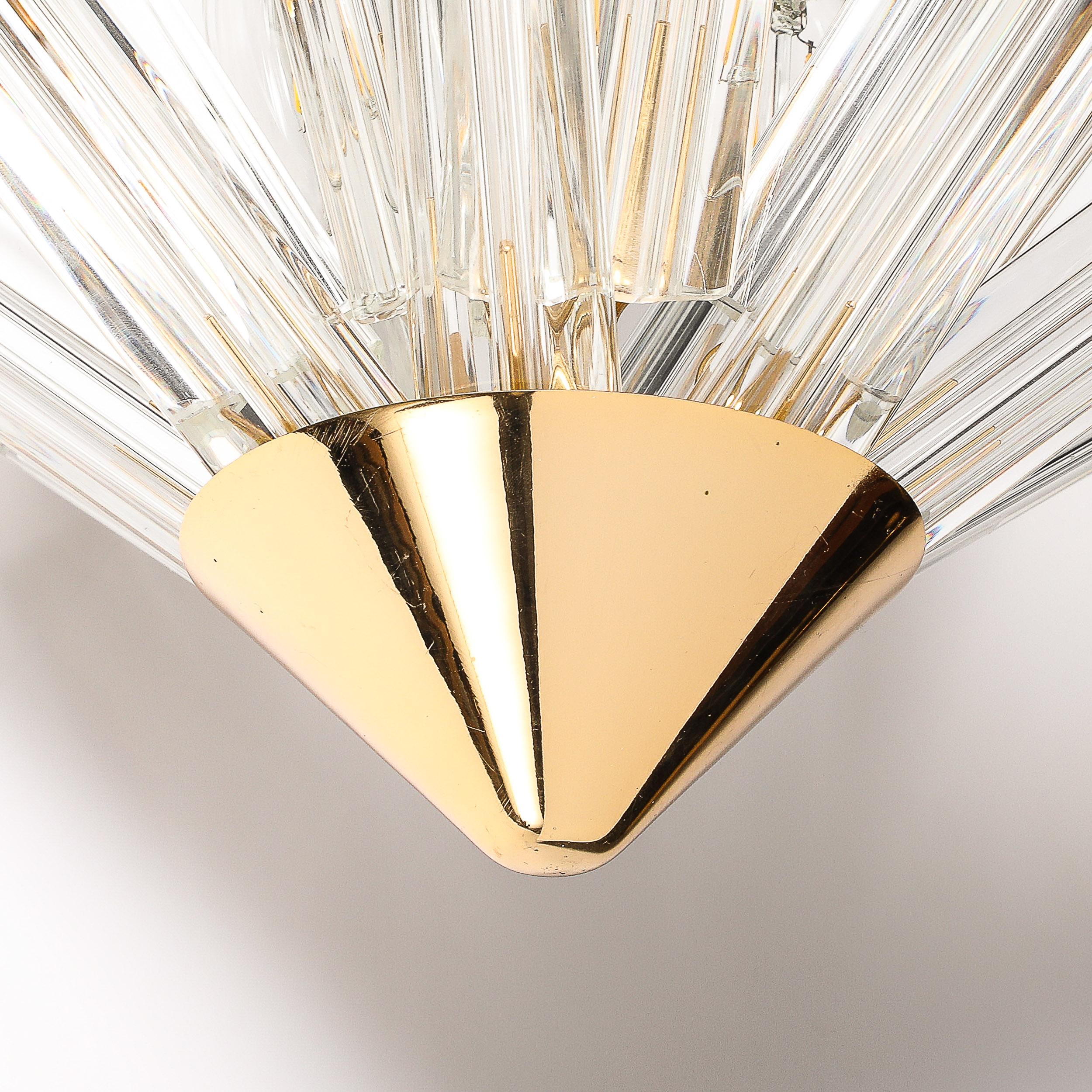This stylish and dynamic Mid-Century Modernist Expanding Hand-Blown Murano Glass Triedri sputnik Chandelier W/ Brass Fittings originates from Italy, Circa 1970. Features a conical brass element at the base of the chandelier supporting an expanding