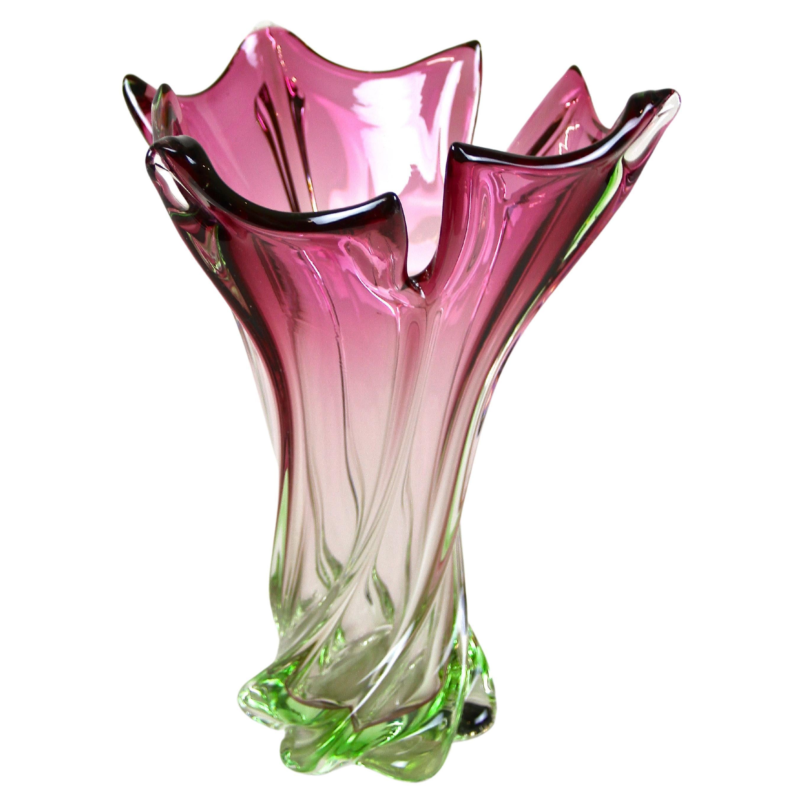 pink glass vase with clear handles r trademark symbol