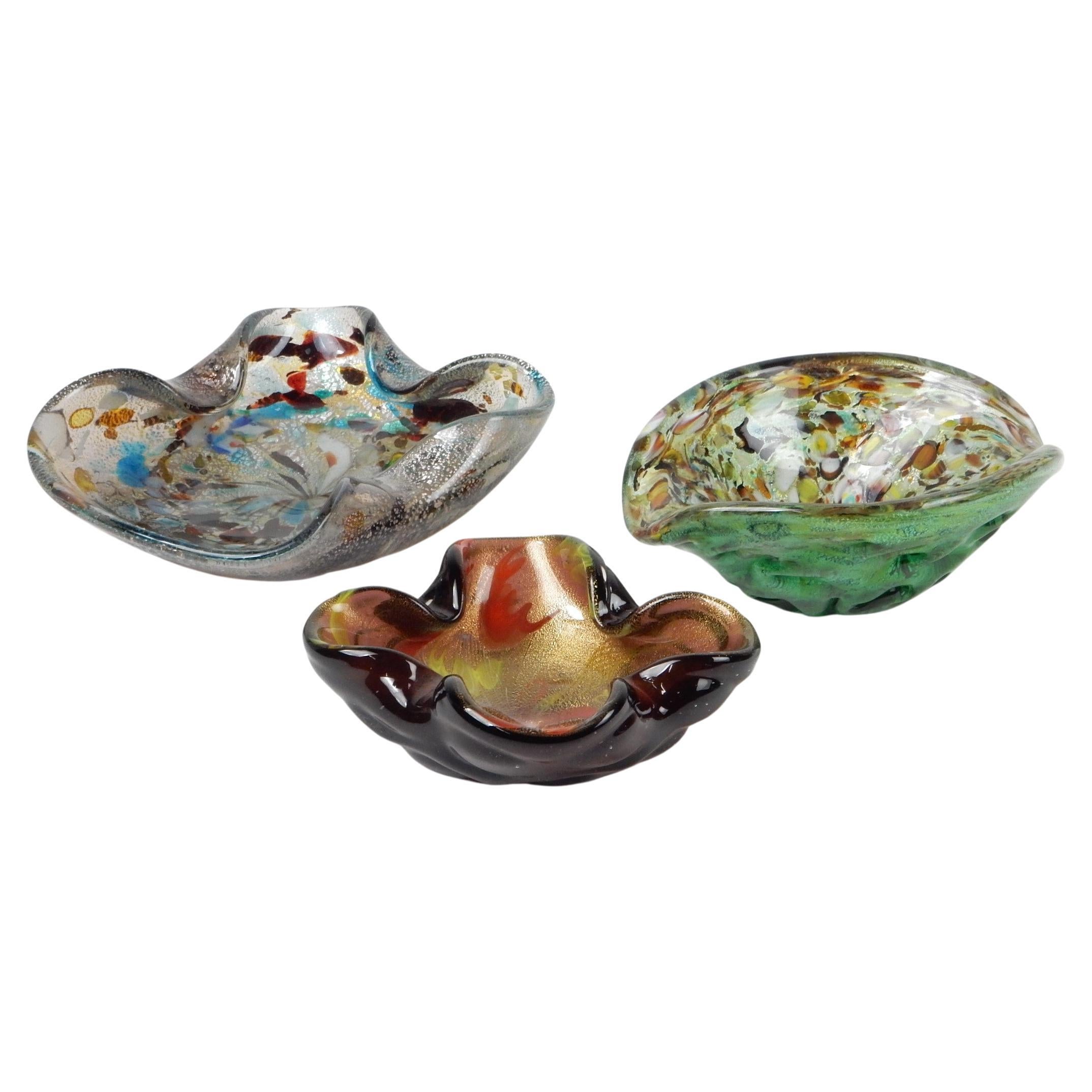 Lovely set of 3 Murano Italy art glass bowls / ashtrays.
Circa 1950's-60's. 
None are marked or etched. All are in excellent condition without chips.
They measure 8
