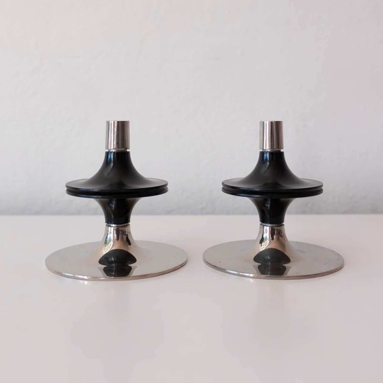 A pair of uncommon 1960s modernist stackable and modular candle holders, designed by Werner Stoff and commissioned by Hans Nagel for Gebrüder Nagel AG, Wesseling, Germany. This set can be combined with the more common Nagel modular candle set.