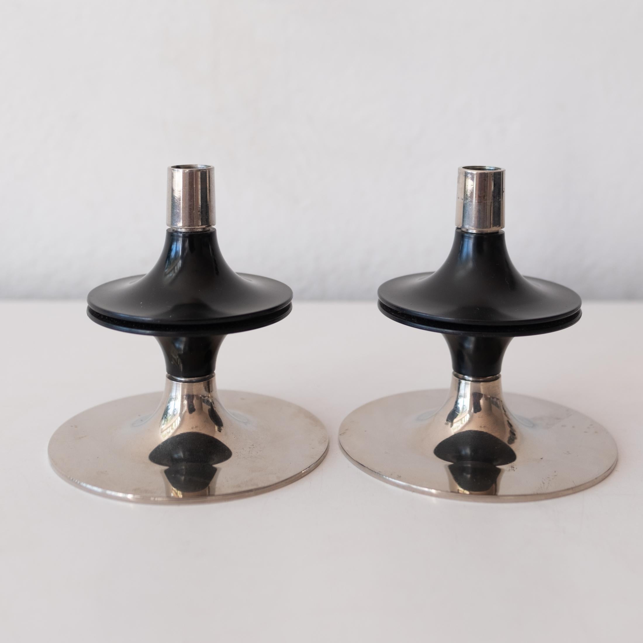 A pair of uncommon 1960s modernist stackable and modular candle holders, designed by Werner Stoff and commissioned by Hans Nagel for Gebrüder Nagel AG, Wesseling, Germany. This set can be combined with the more common Nagel modular candle