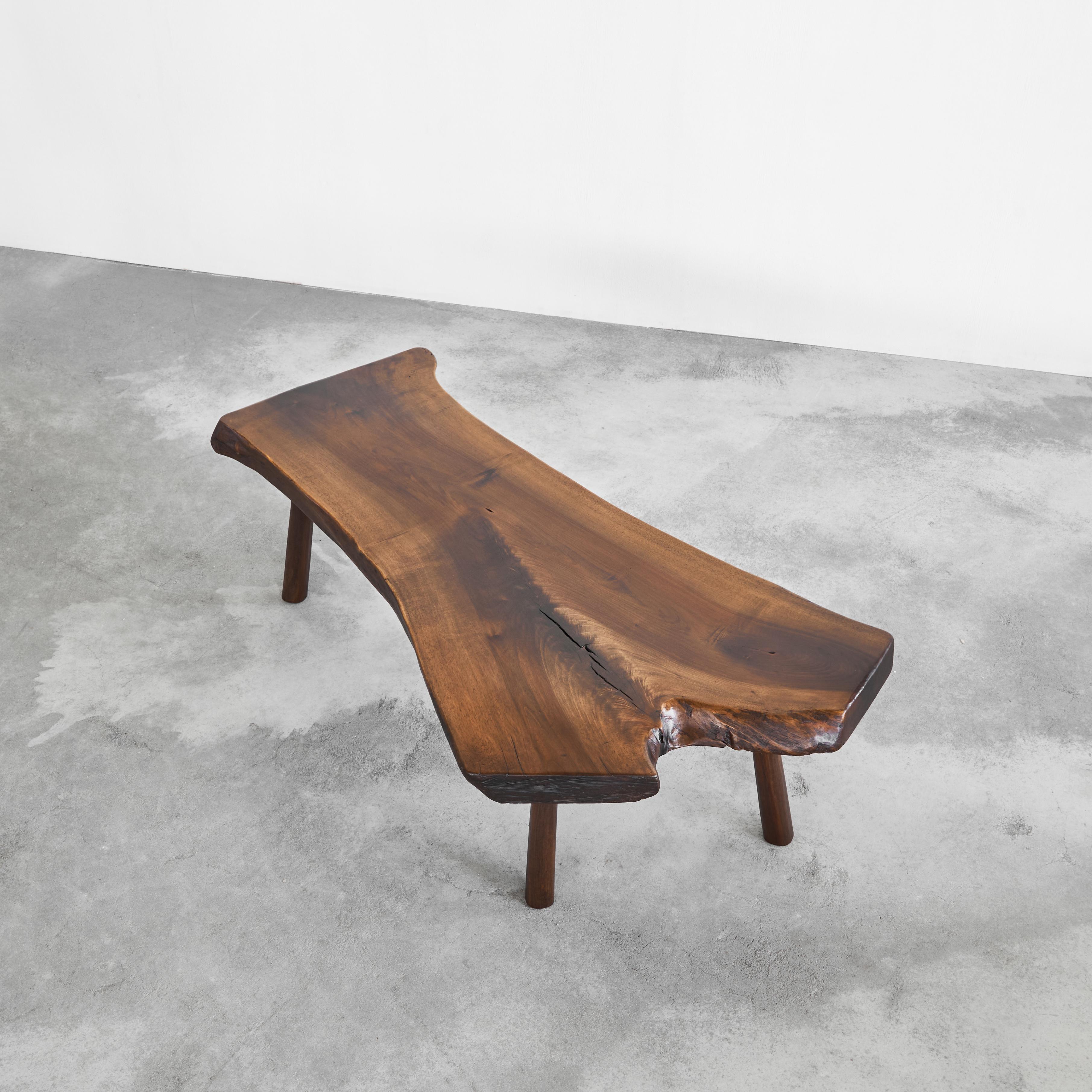 Midcentury Live Edge Coffee Table in Solid Walnut, Europe, 1950s. Fully restored. 

This is a stunning and very elegant live edge coffee table made out of solid walnut by a European cabinetmaker in the 1950s. Made on request for the first owner in