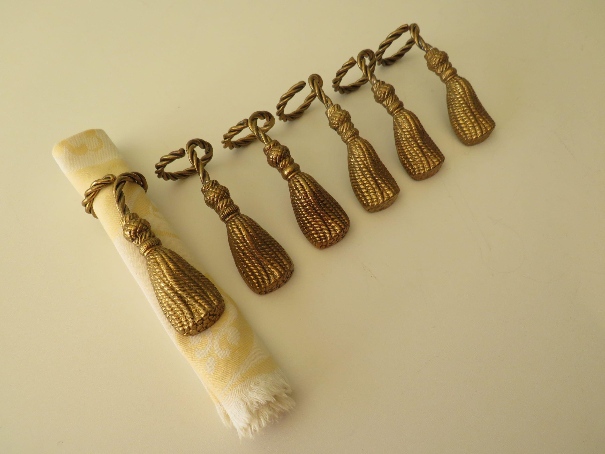 Set of 6 gilded bronze napkin holders.
Total length: 10 cm, diameter of the ring: 4 cm