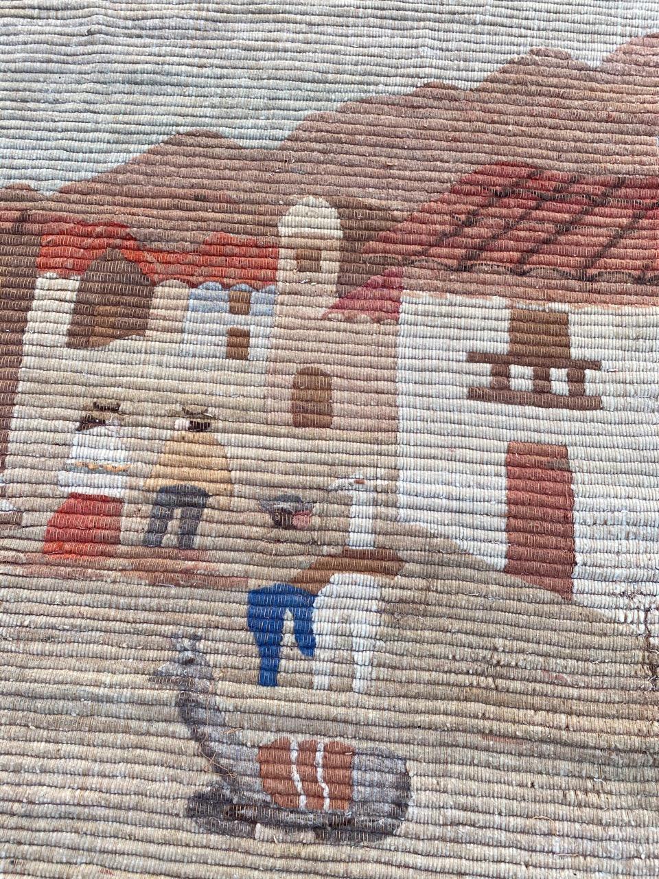 Little tapestry with a native design of the town and beautiful colors, entirely hand worked with wool on cotton and wool foundation.