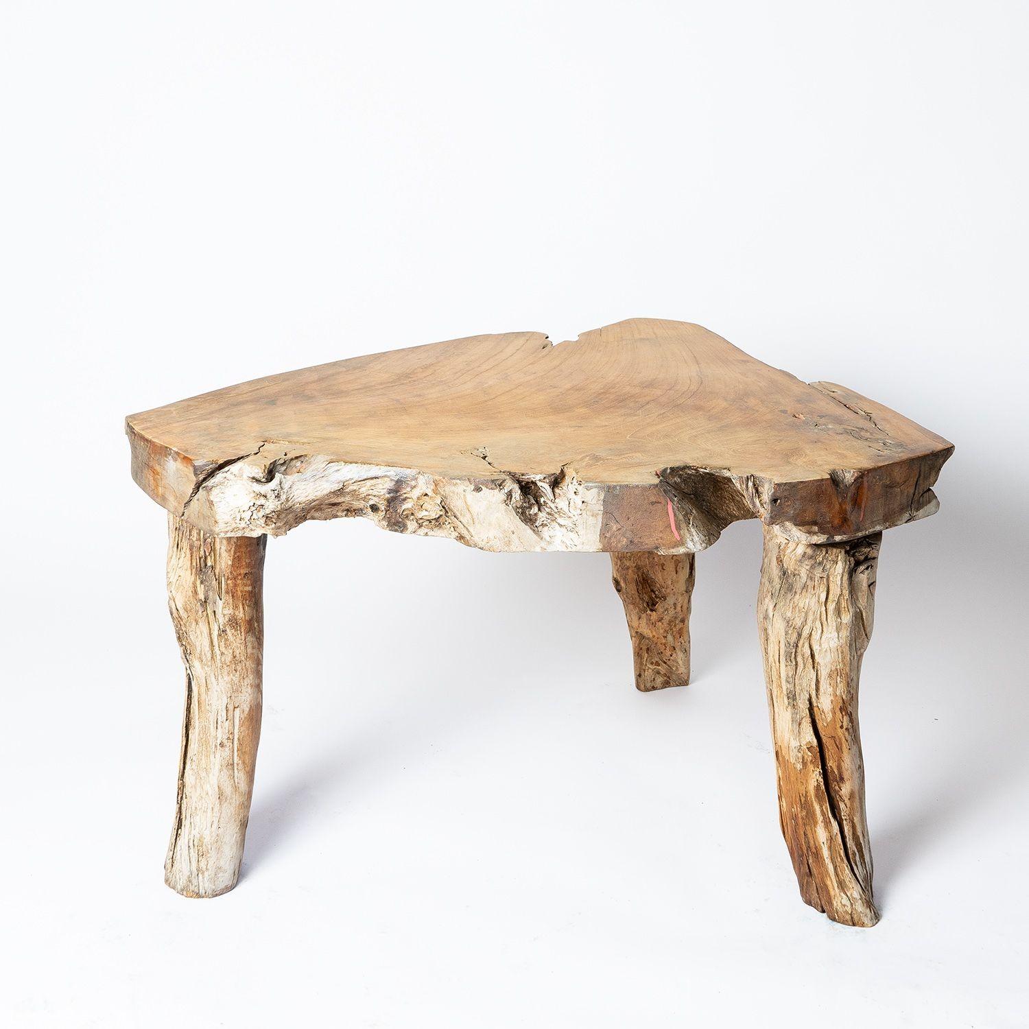 Vintage Rustic Wooden Coffee/Side Table

Chunky wooden top formed from a cross-section of a tree with rough edges and planed top.

Sitting on thick tripod legs formed from tree branches.

Probably French in origin and dating from the Mid-20th