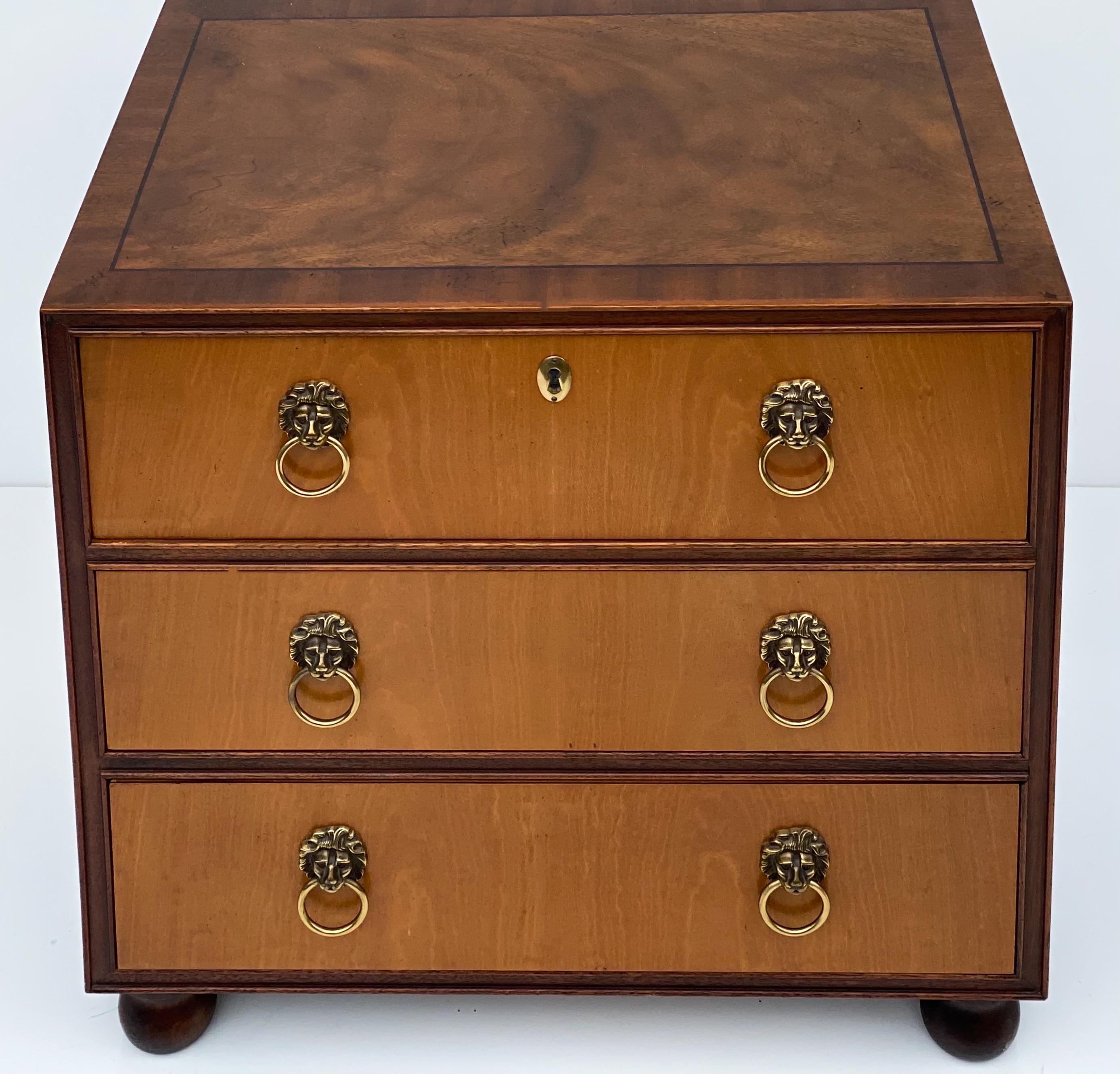 This diminutive neoclassical chest by Baker Furniture would make a nice jewelry casket or watch valet or even a side table. It is marked and in very good condition.