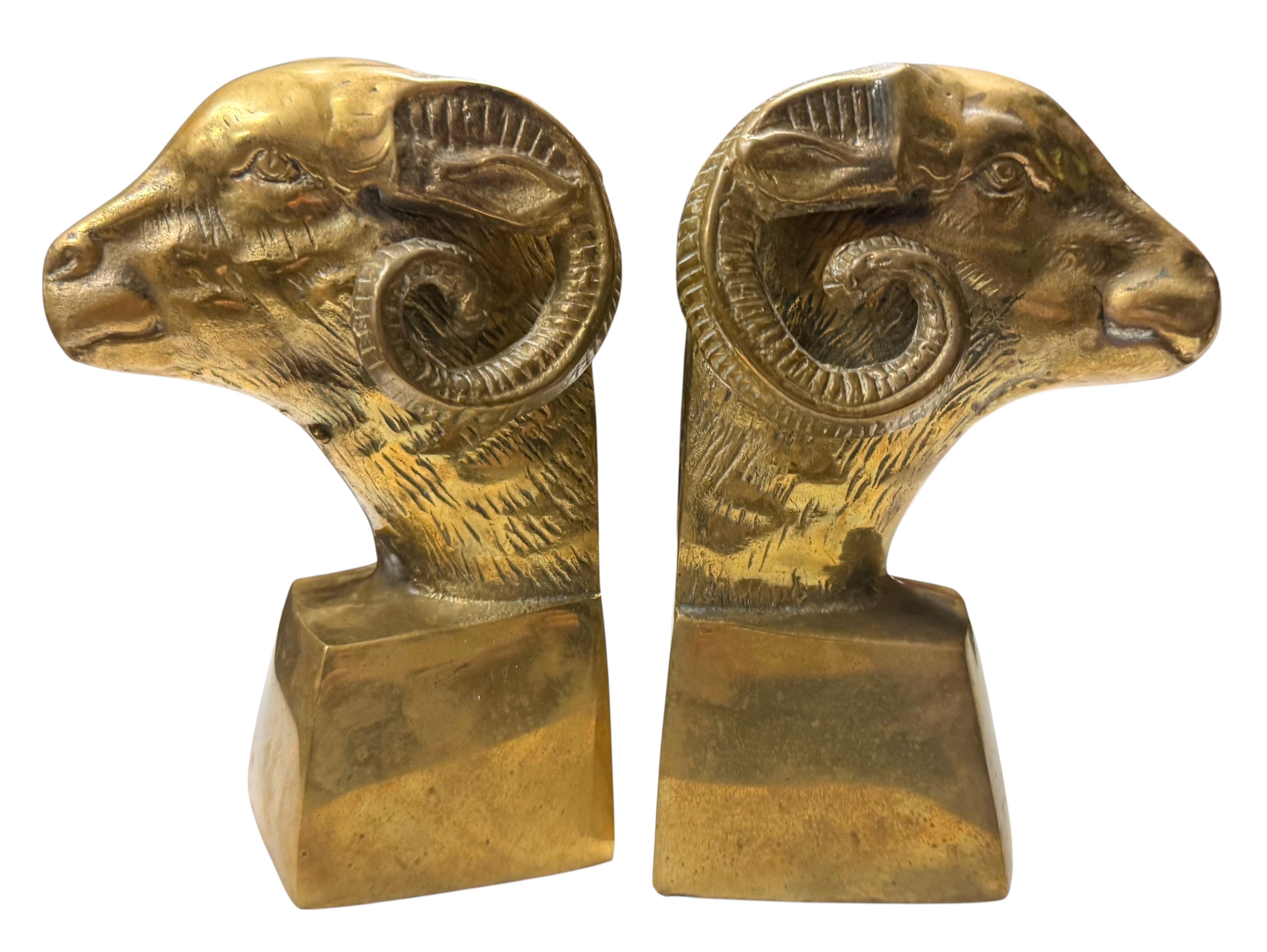 This is a handsome pair of Neo-Classical style bookends. The ram heads are a heavy cast brass. They are in good shape and unmarked. The bottoms are felt lined. I estimate that they are American and date to the 1960s.