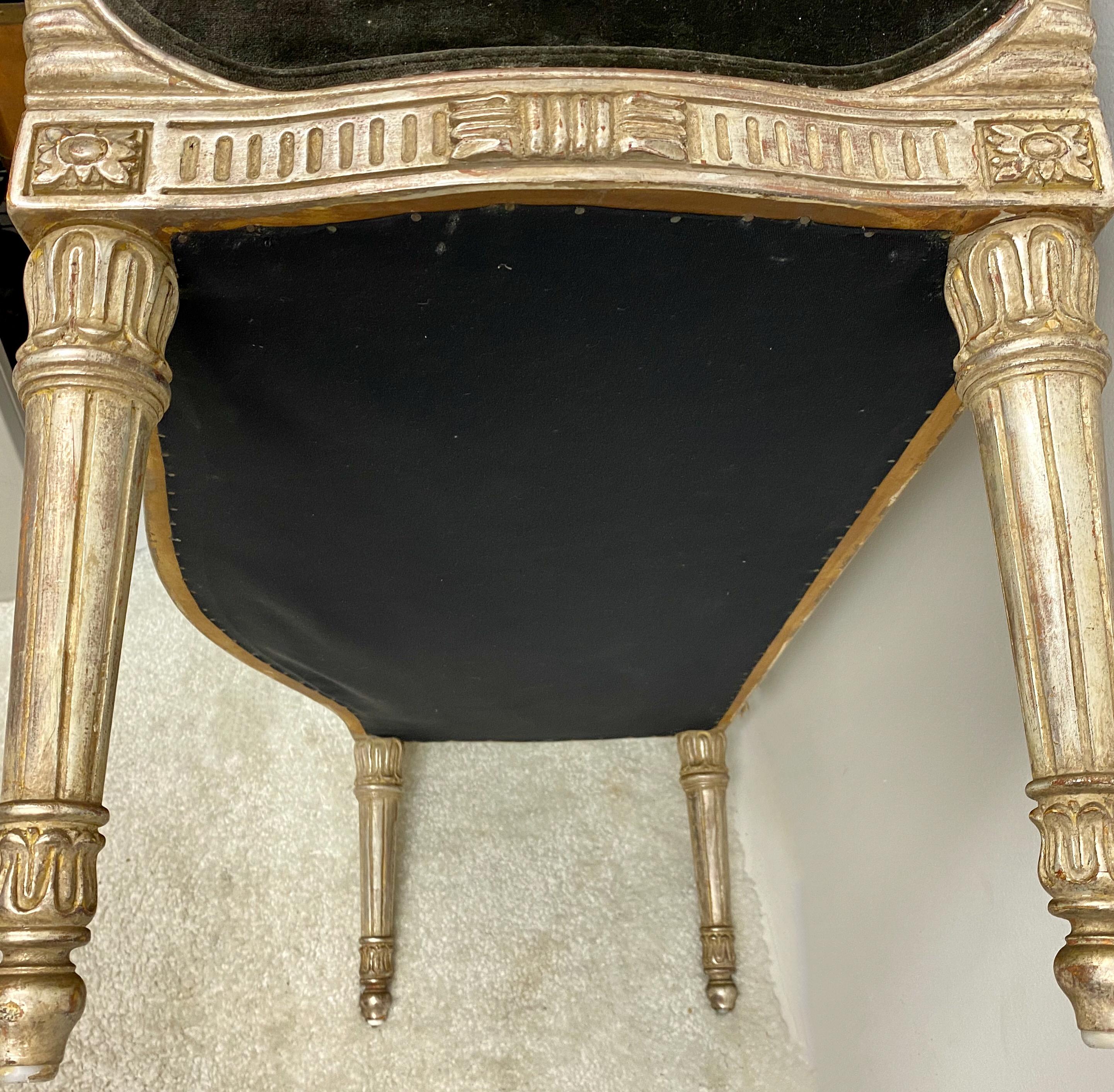 This is a midcentury, most likely 1950s, carved Italian bench with vintage mushroom colored crushed velvet. The frame has a beautiful silver gilt finish. It is unmarked. Measures: Seat 18”.