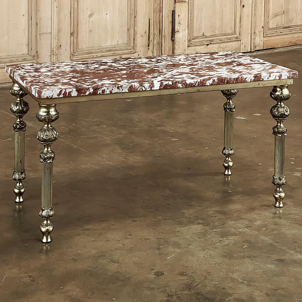 Mid-Century neoclassical brass & marble coffee table was crafted from the highest quality materials to last for centuries! Heavy cast brass urn forms mated to fluted columns then to teardrop shaped feet provide support for the brass framework which