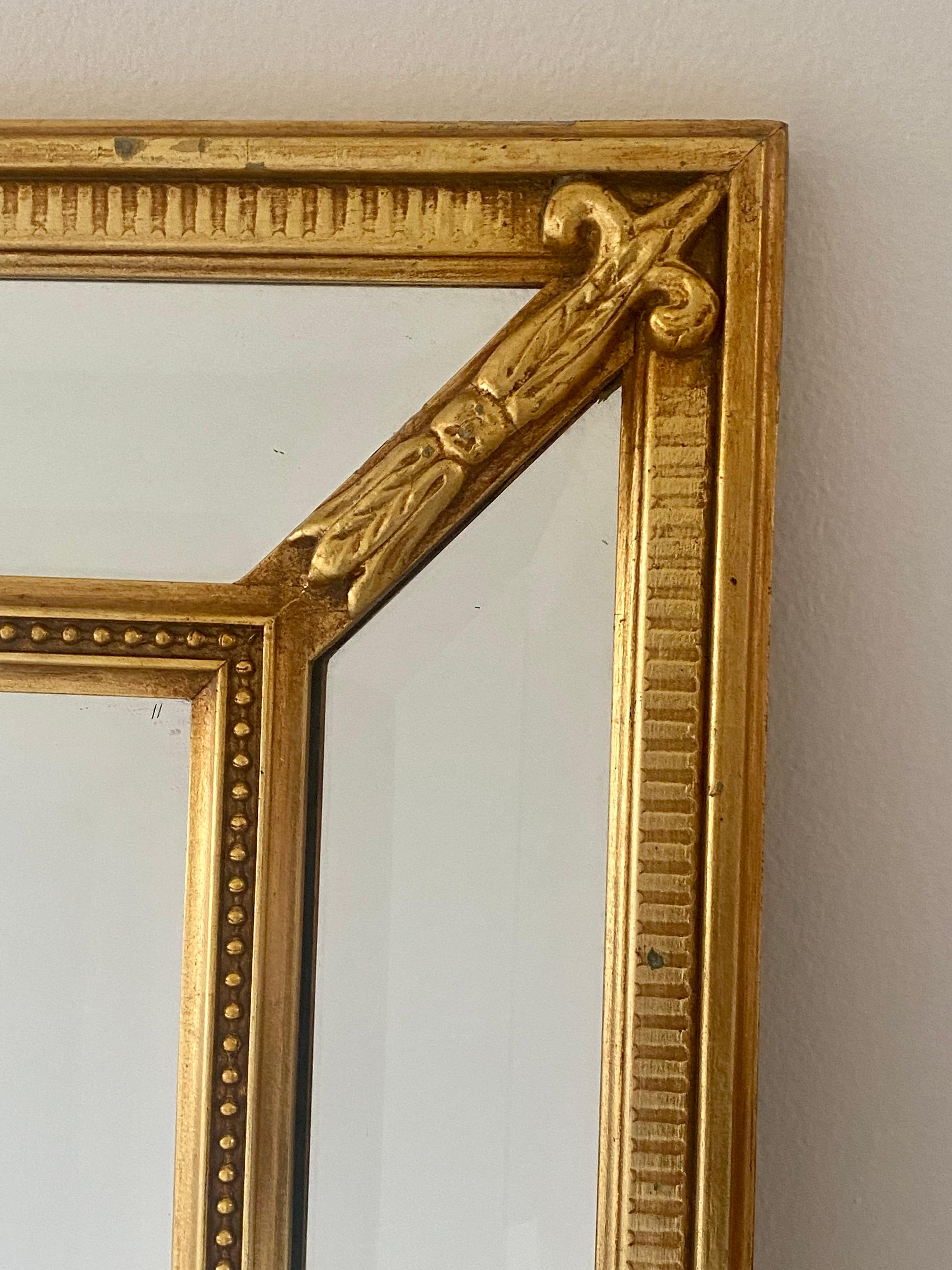 Sublime Fleur de Lys gilt wood frame multiple Beveled mirror Pieces, circa 1950s, from a Palm Beach Estate.