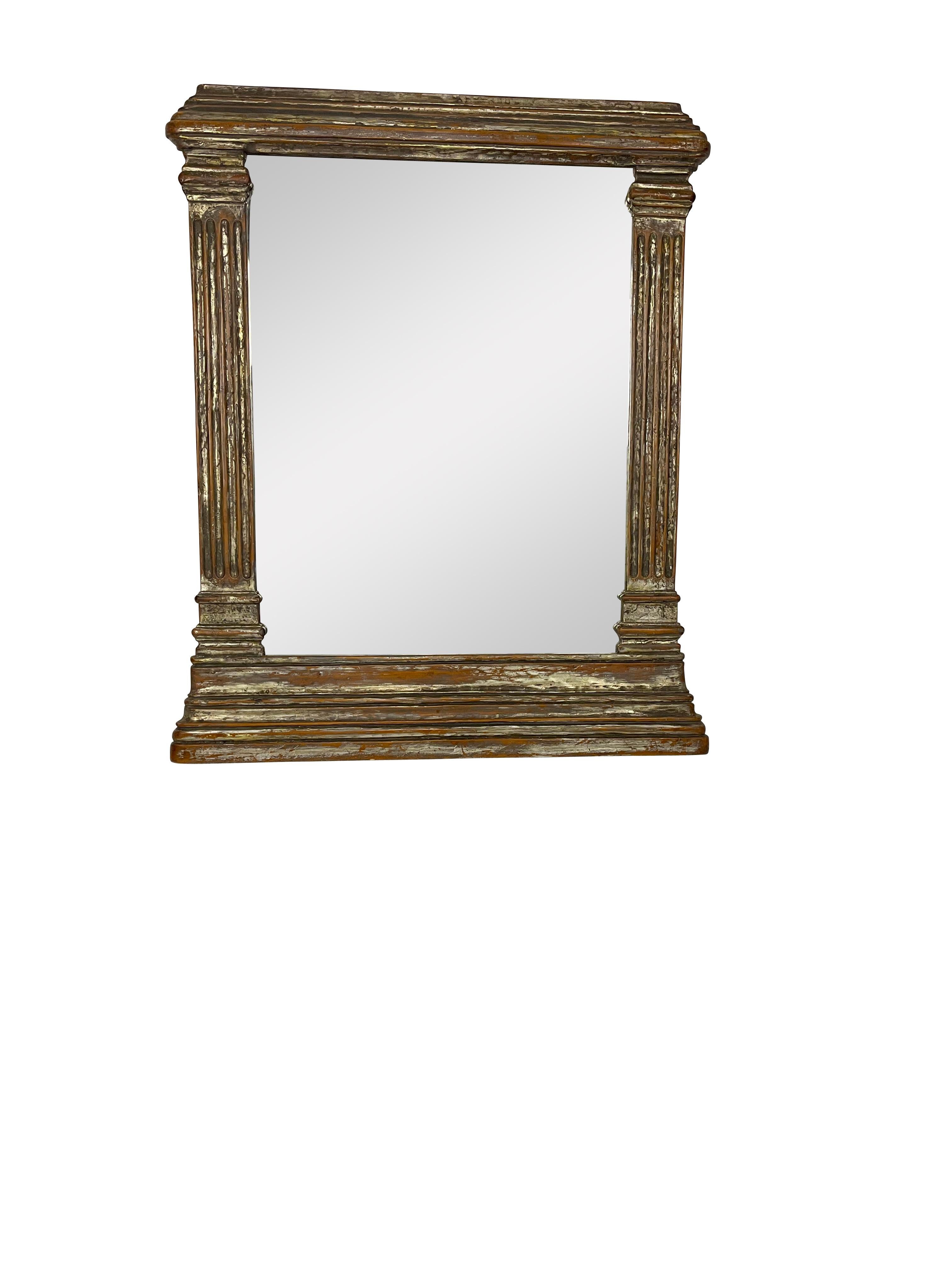 Italian  Neoclassical Style Gilt and Silvered Mirror with Carved Columns For Sale