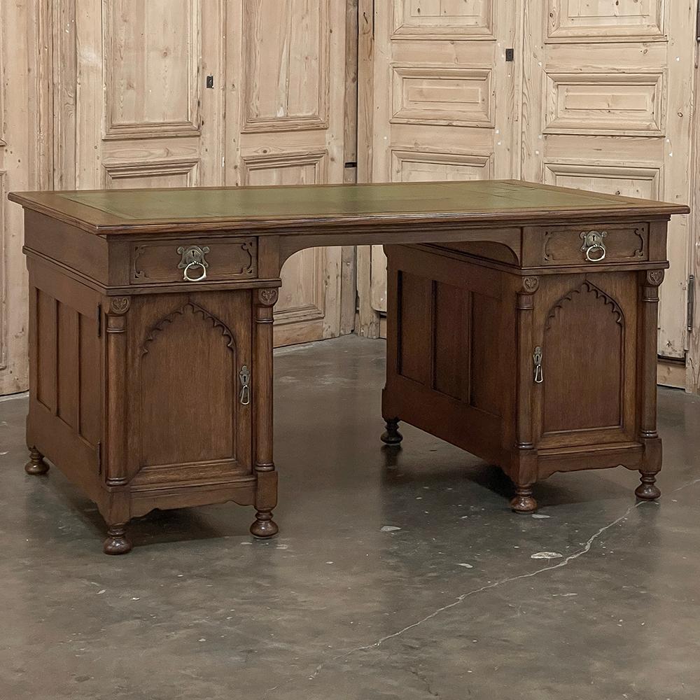 Mid-Century Neogothic Leather Top Desk by Jansen & Sons of Amsterdam is a splendid result of high-grade materials and expert craftsmanship producing heirloom-quality furnishings that can be enjoyed for generations!  The tailored lines of this design