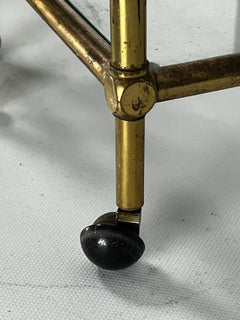 Mid-Century nesting set of three bar carts in brass and glass. Italy 1950s
