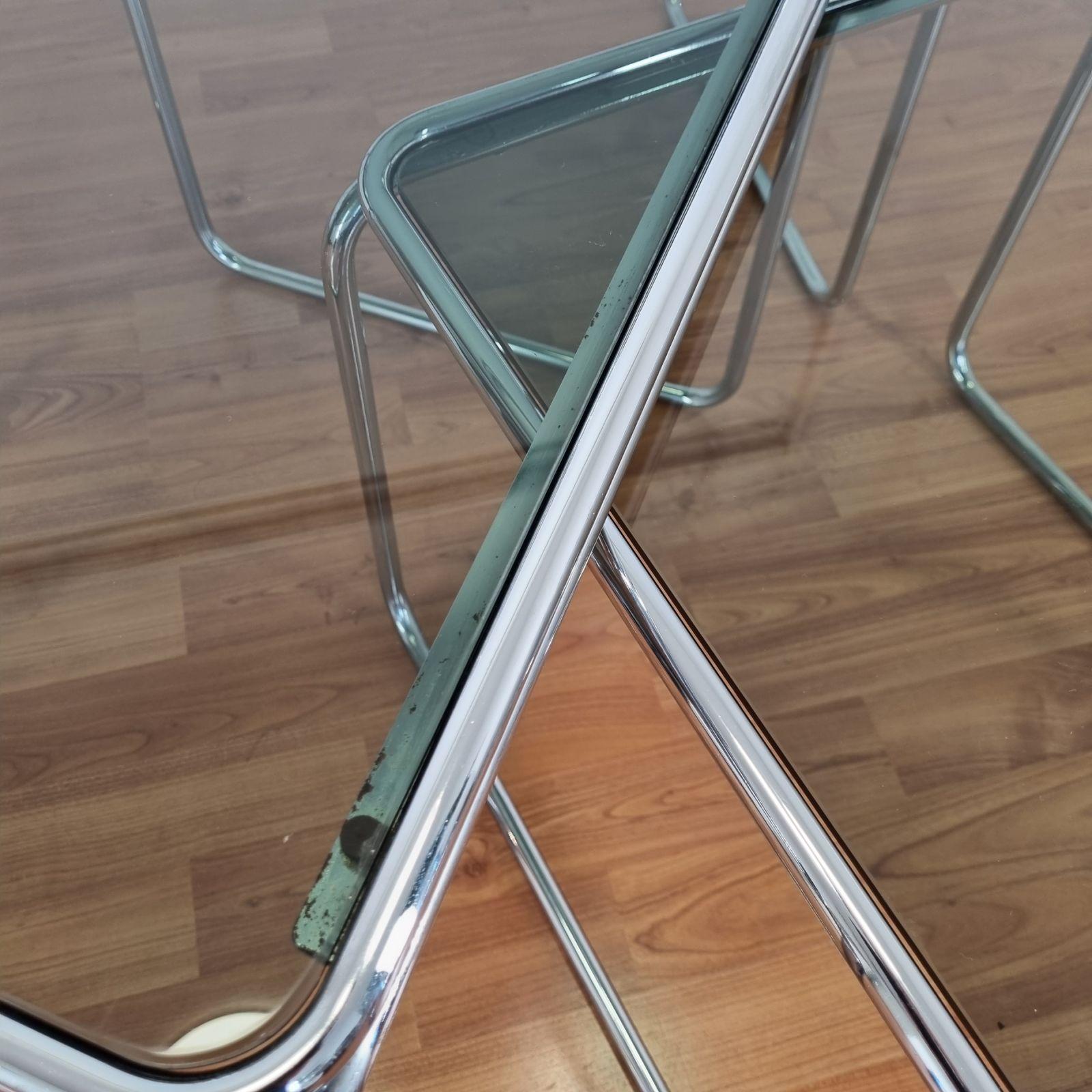 Set of 3 coffee tables from the 70s era. Made in Bauhaus style in Italy.
Made of metal chromed legs and glass. In verry good vintage
condition with minor signs of use.