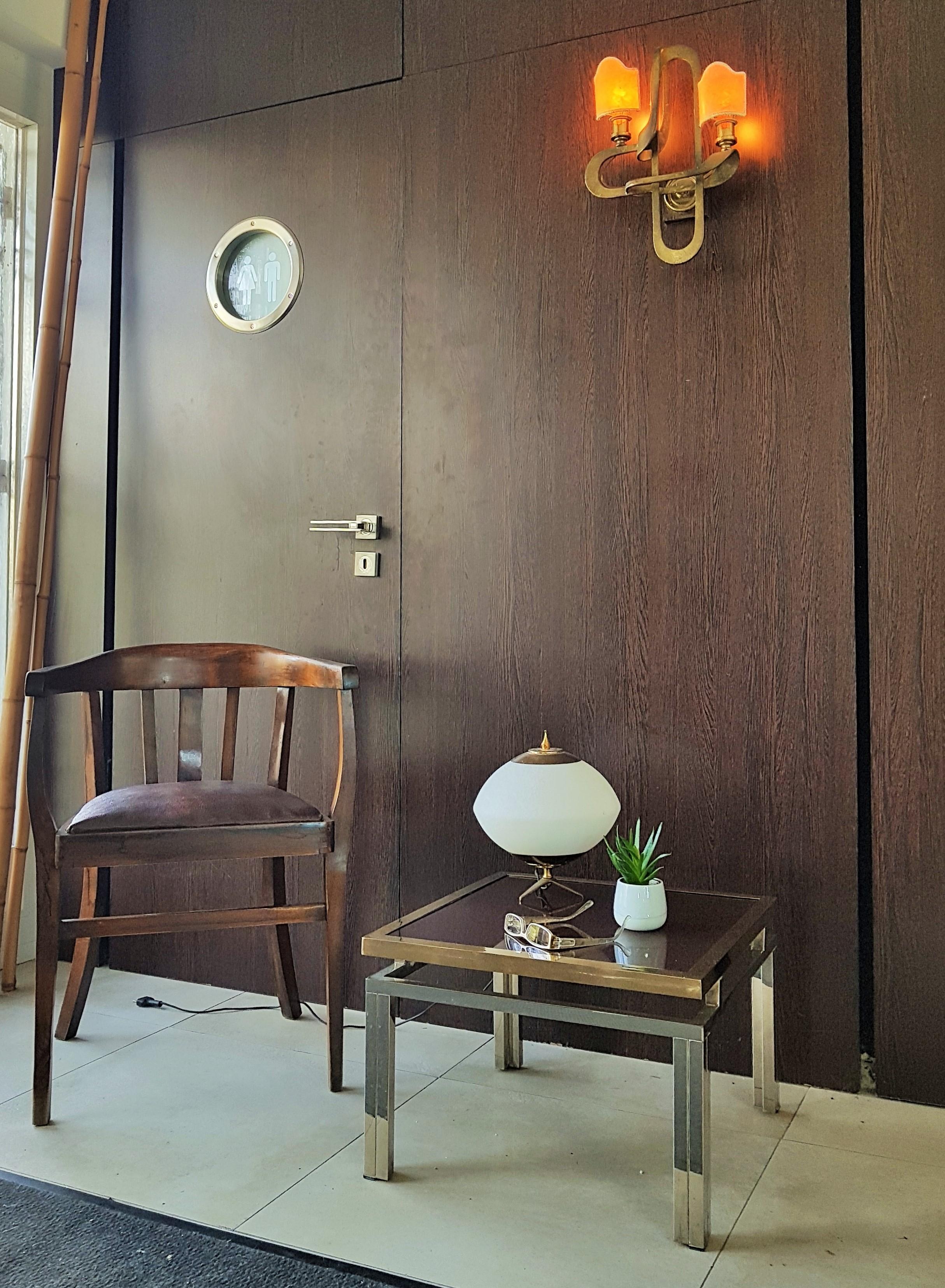 Midcentury nickel and brass side table by Guy Lefevre for Maison Jansen, France, 1970s.

Colored glass top. 

Unrestored vintage conditon.