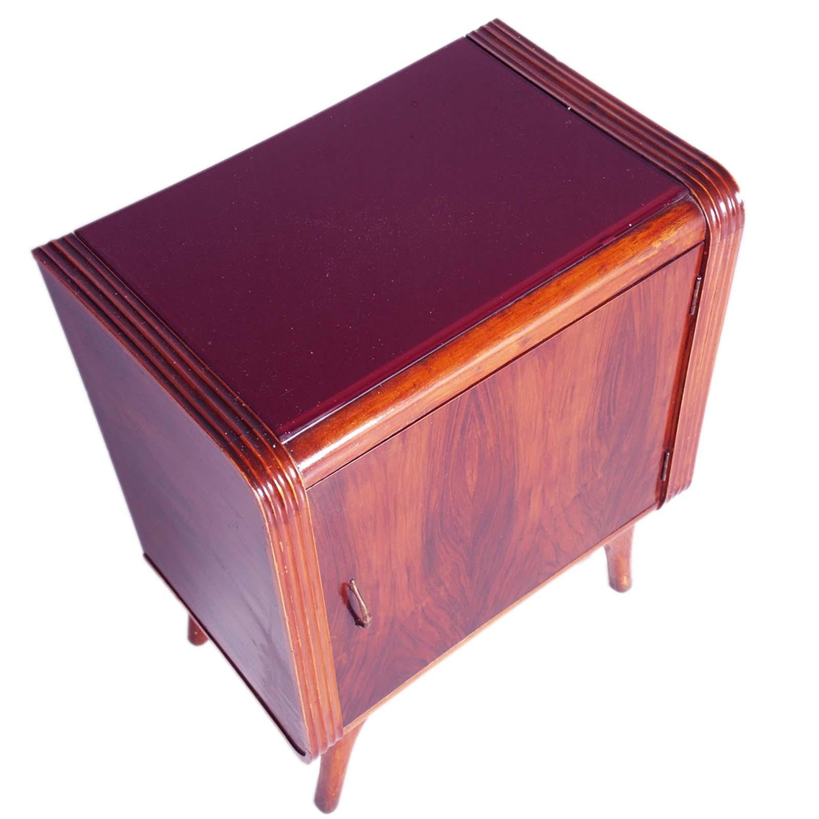 Very stylish Mid-Century Modern nightstand by Permanente Mobili, Paolo Buffa designer atributed, in walnut and veneer walnut, mahogany veneer interior. Wax polished

About the Designer
Paolo Buffa
One of the greatest Mid-Century Modern designers