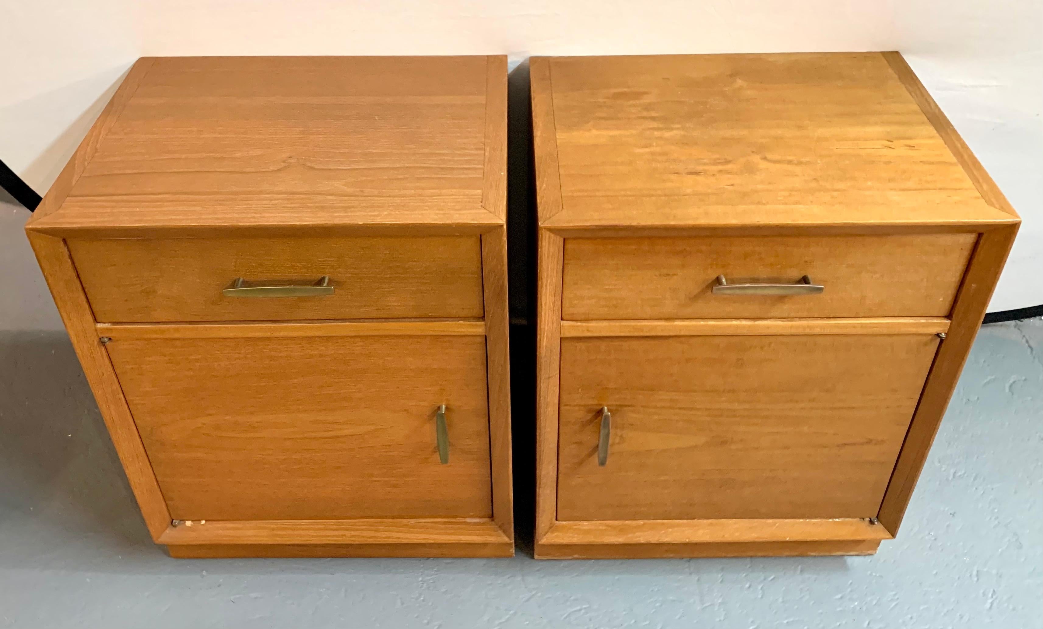 Pair of mid century nightstands with one top drawer and bottom door that opens to store your books, magazines etc.