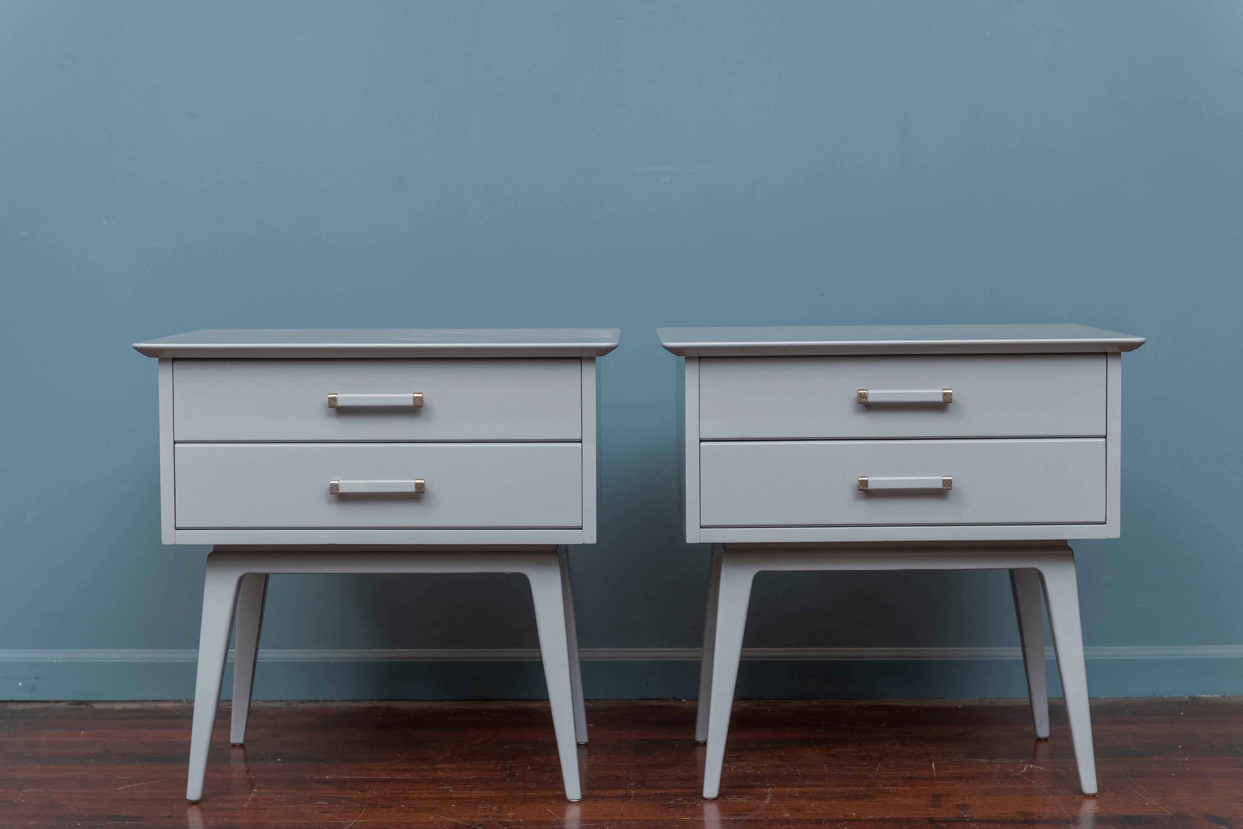 Mid-Century Modern nightstands designed by Renzo Rutili for Johnson Furniture Co. Originally part of a larger bedroom set designed by Rutili and made from solid birch and newly lacquered in a soft light gray. Comprising two drawers on splayed legs,