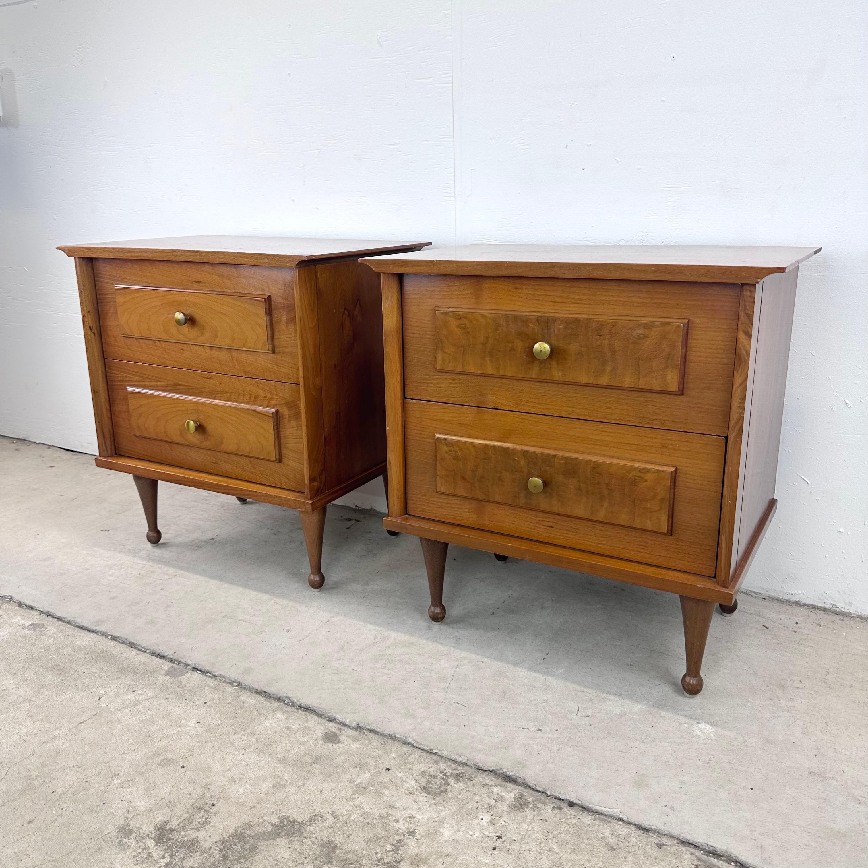 This pair of Mid-Century Modern Nightstands bring a delightful fusion of vintage charm and contemporary elegance. Crafted with meticulous attention to detail, this matching pair of bedside tables capture the essence of mid-century design.

The clean