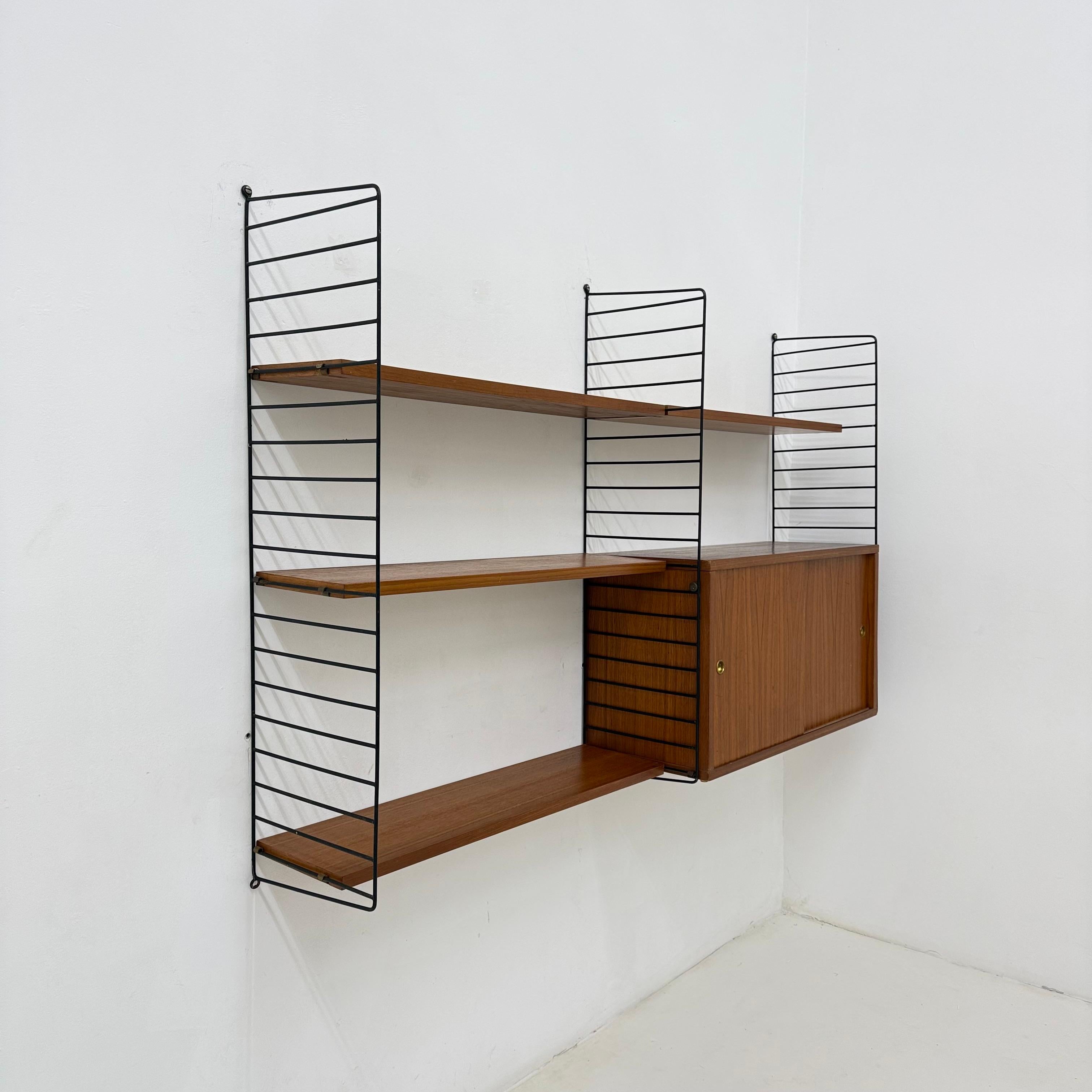 Mid-Century Nisse Strinning string design teak wall unit , 1960s For Sale 11