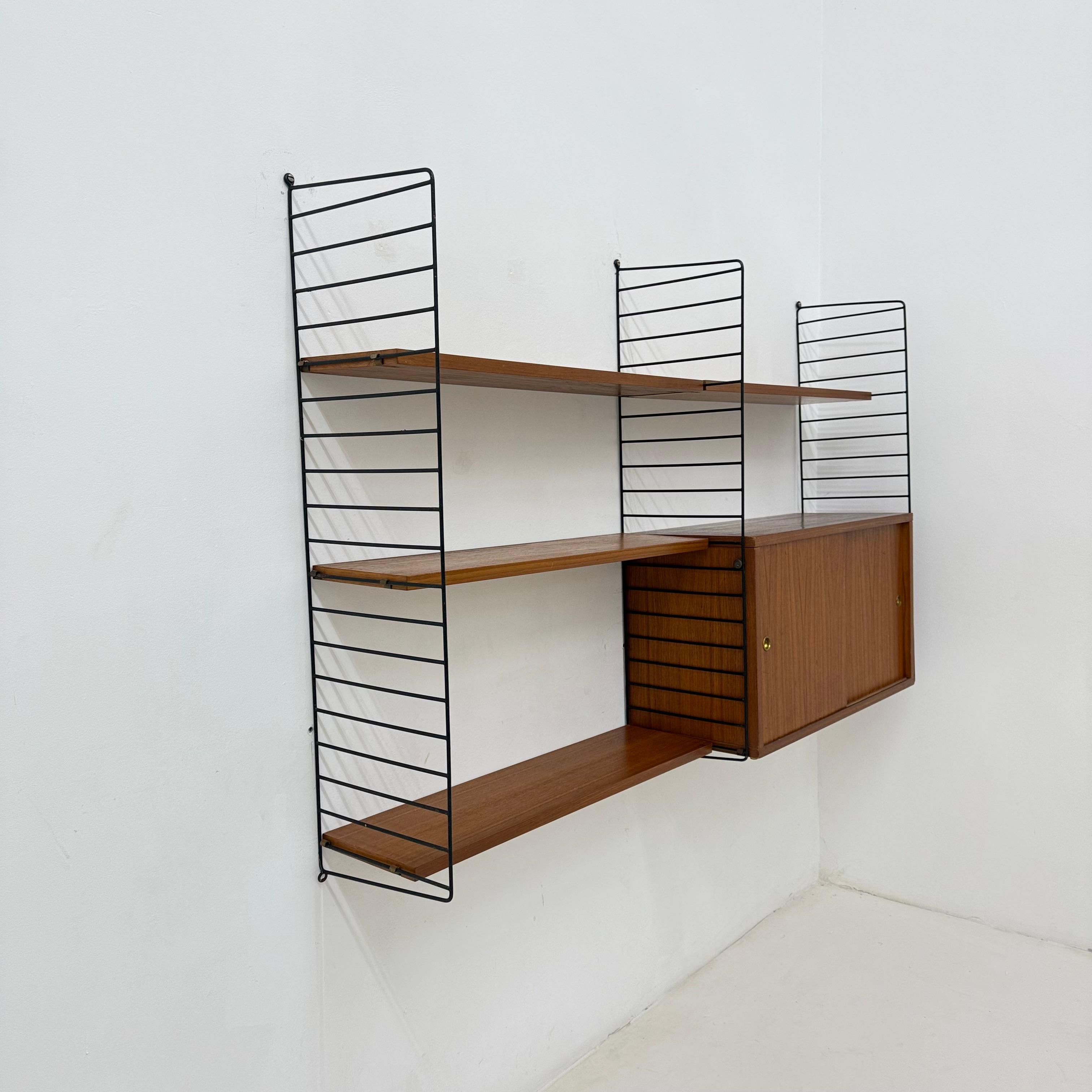 Mid-Century Nisse Strinning string design teak wall unit , 1960s For Sale 12