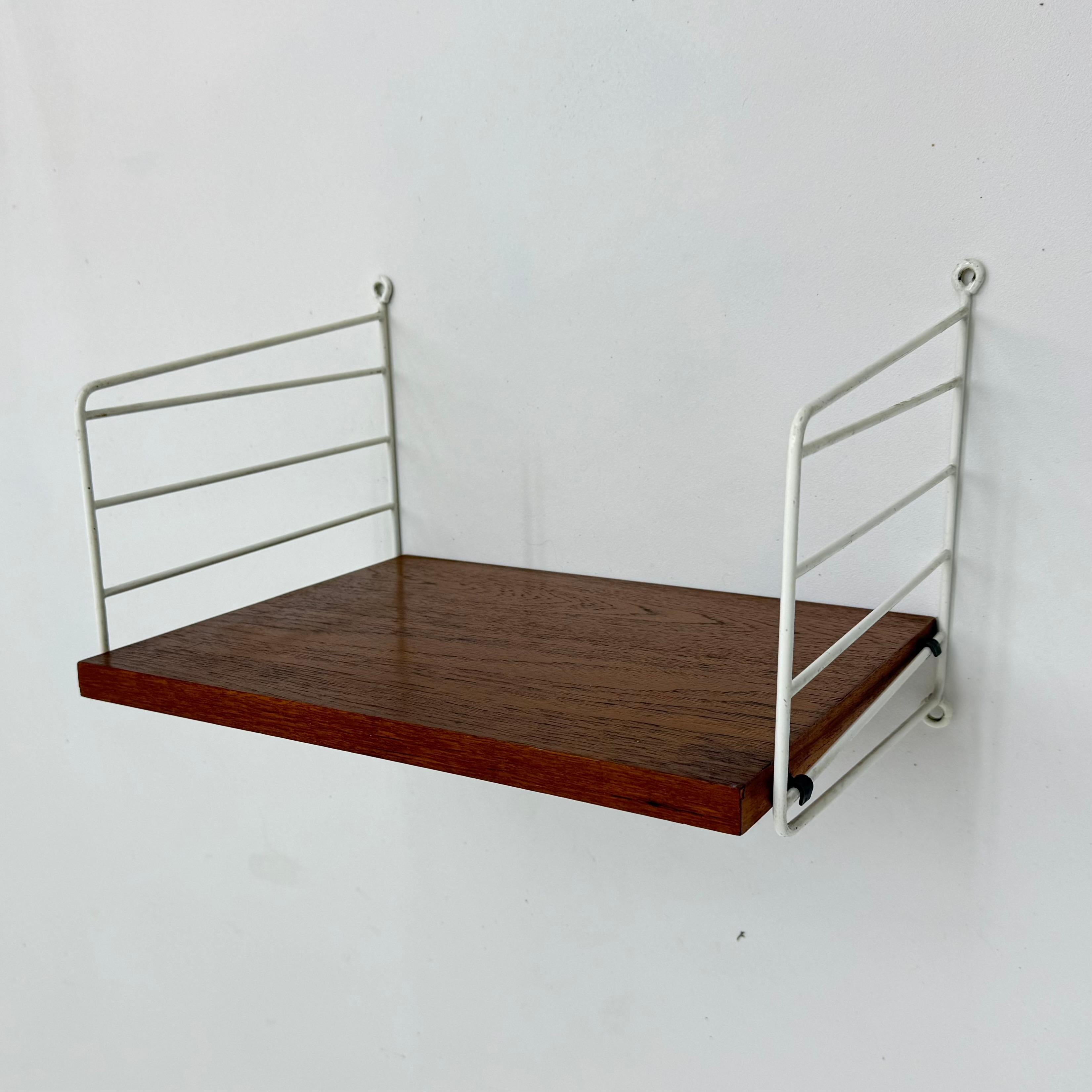 Mid-20th Century Mid-Century Nisse Strinning string design teak wall unit , 1960s For Sale