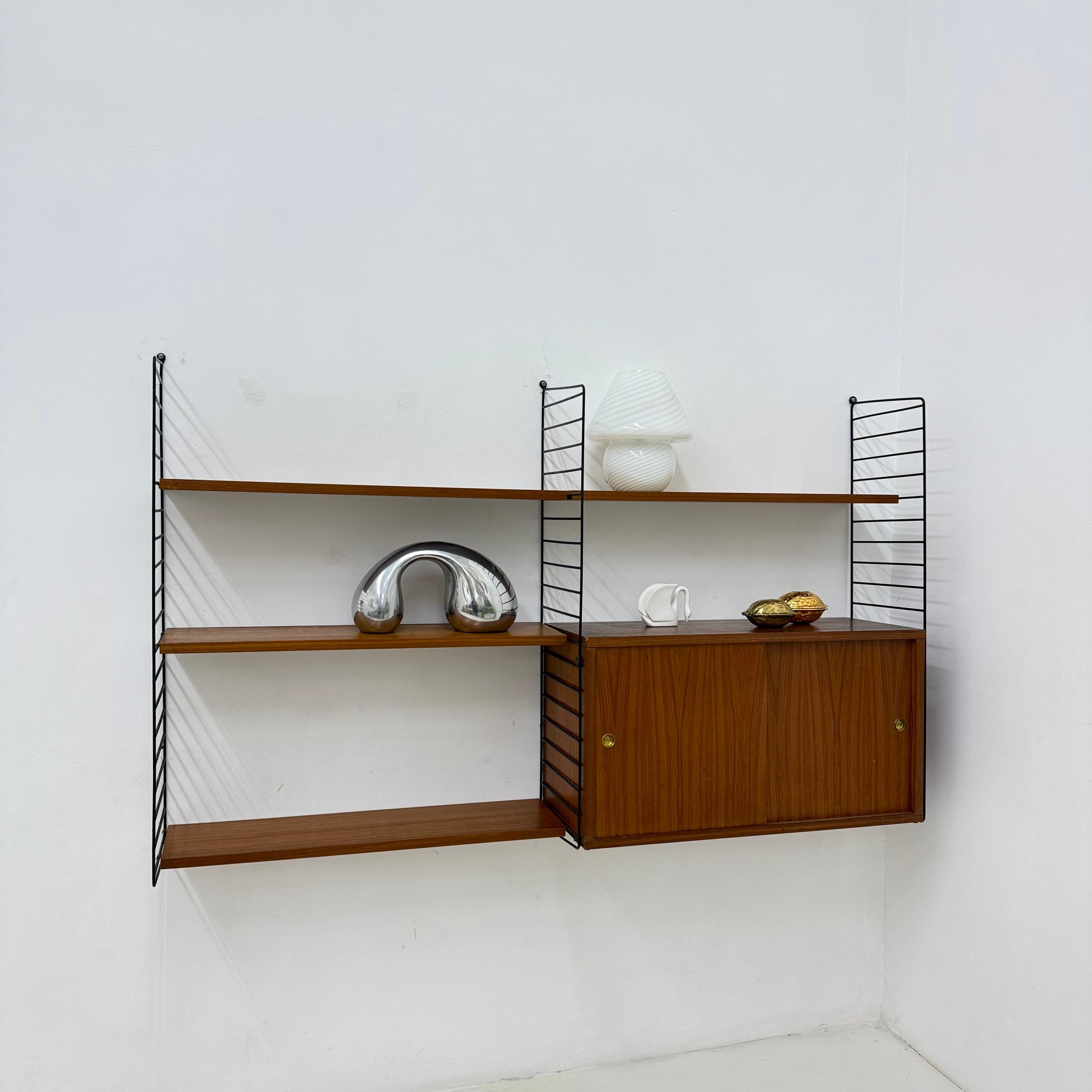 Mid-Century Modern Mid-Century Nisse Strinning string design teak wall unit , 1960s For Sale