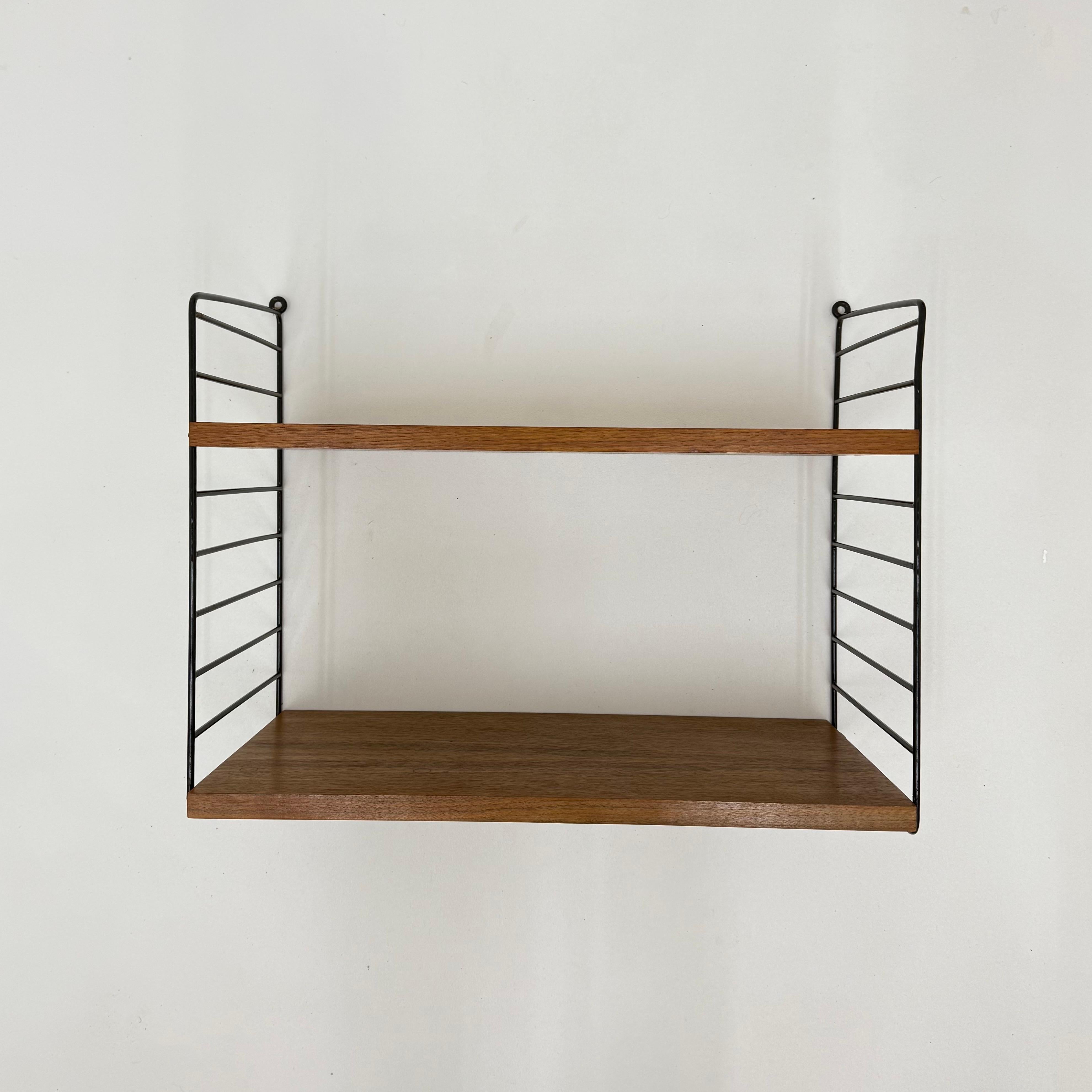 Metal Mid-Century Nisse Strinning string design teak wall unit , 1960s For Sale