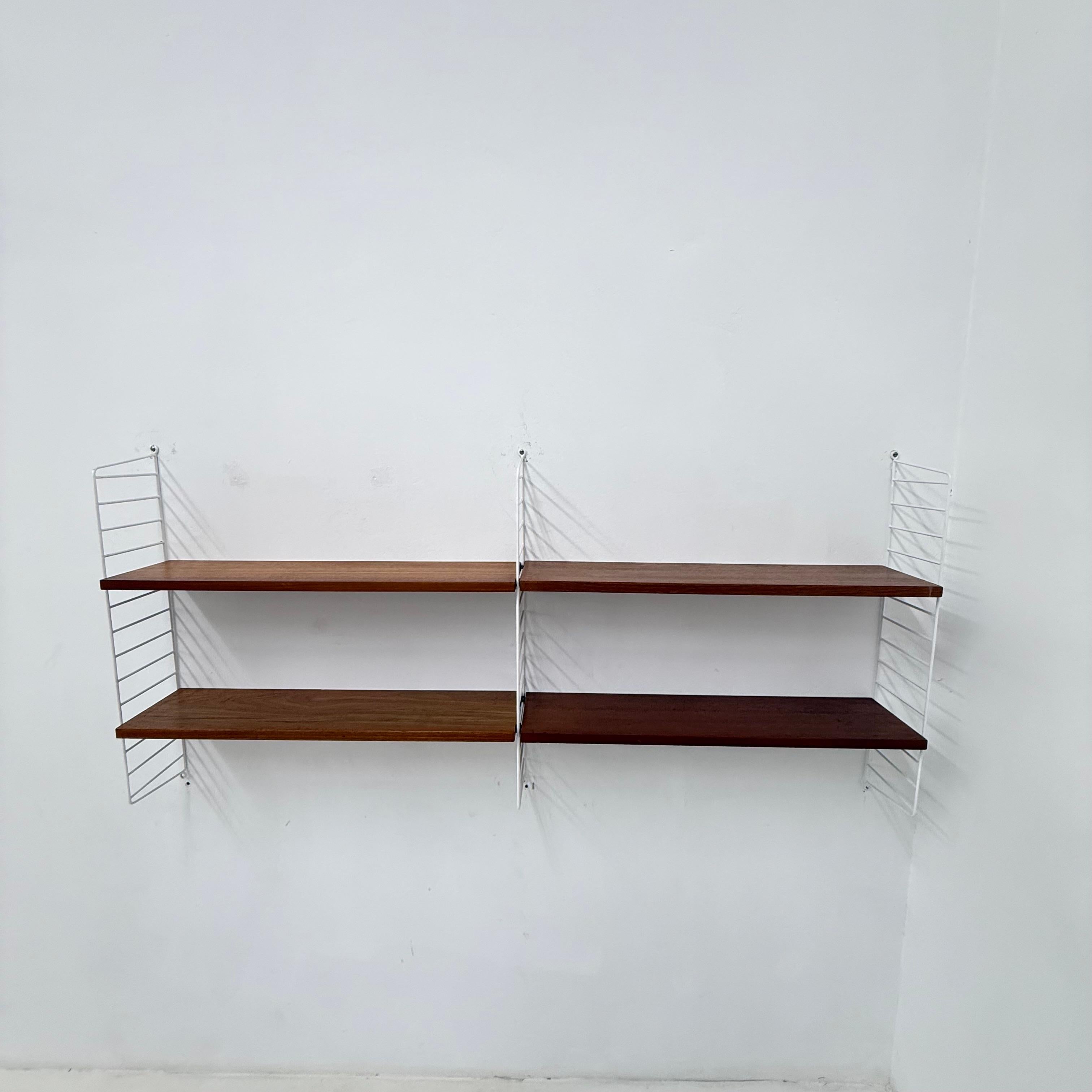 Metal Mid-Century Nisse Strinning string design teak wall unit , 1960s For Sale