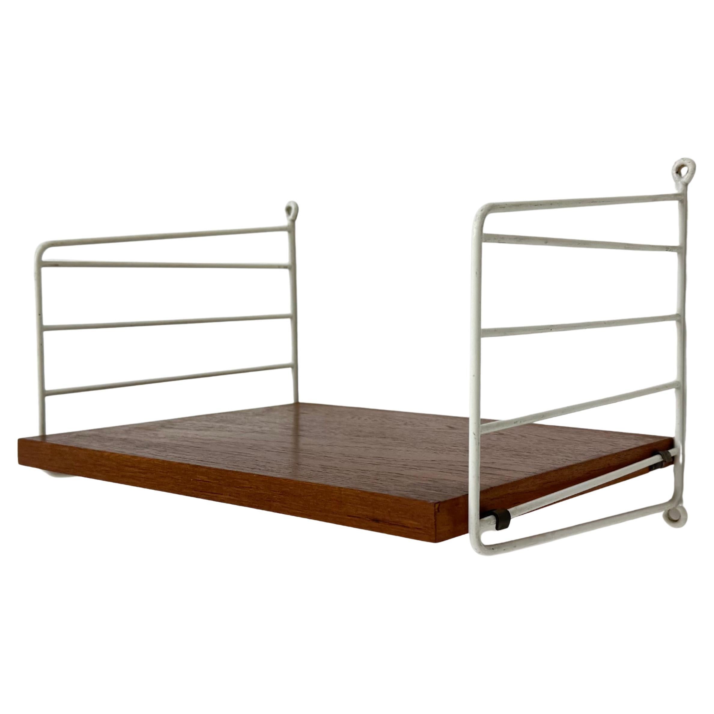 Mueble alto de teca de mediados de siglo Nisse Strinning string design , años 60