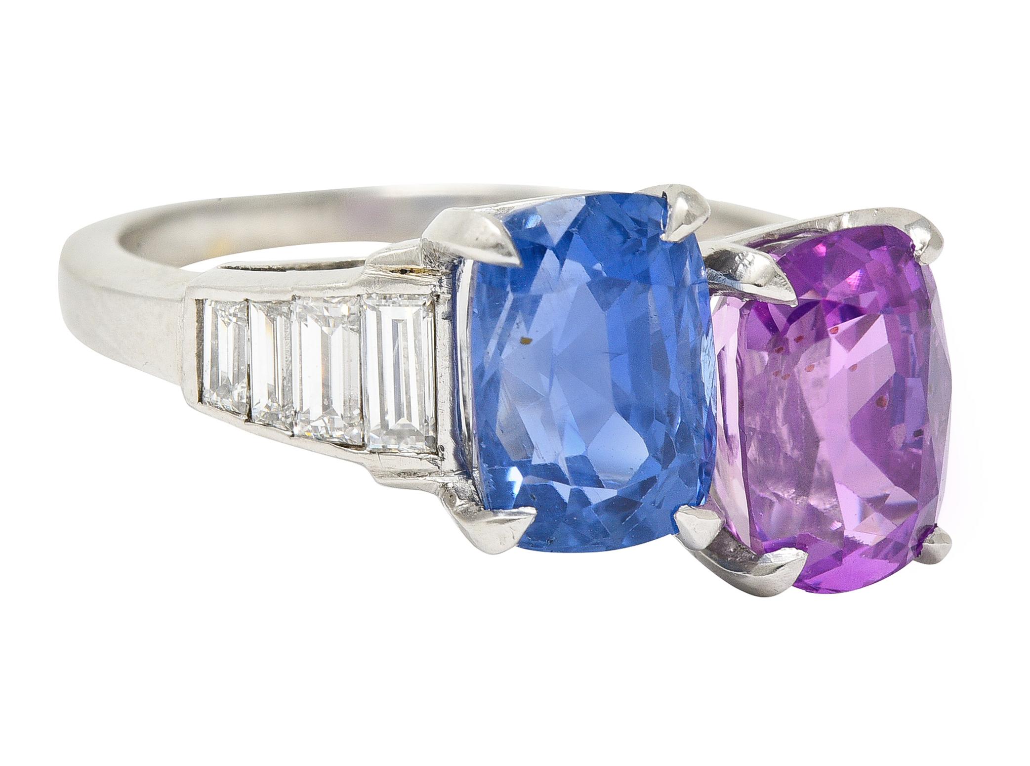 Designed as a bypass-style mounting terminating with two prong set cushion cut sapphires
One sapphire is transparent medium blue and weighs approximately 3.47 carats
The other is transparent medium purplish-pink in color and weighs approximately