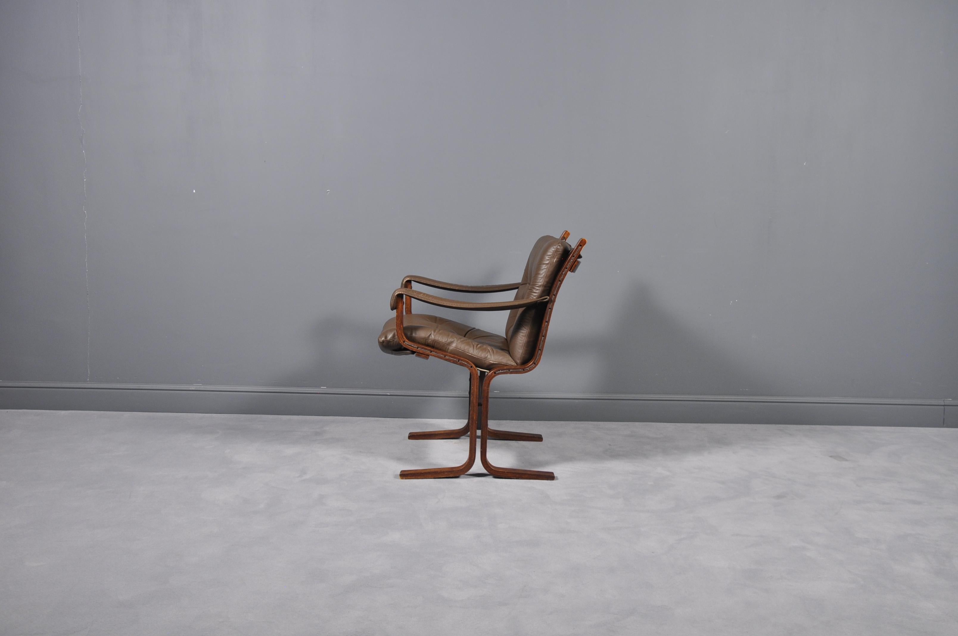 Condition: Very good with only small signs of age related use and wear, in the form of surface rubbing to the front of the left hand arm and some fraying to small areas of the cord to the sides of the chair.

Description: A stylish Norwegian