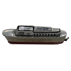 Accendino smaltato "Marin Ship & Supply", nave da crociera, della metà del secolo scorso