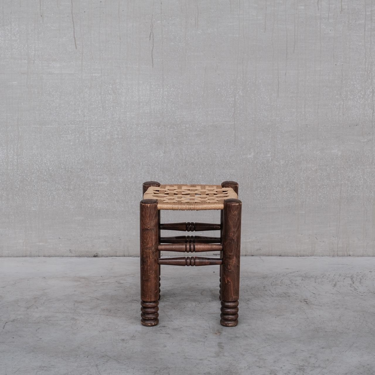 A single mid-20th stool. 

France, c1940s. 

Oak and cord. 

Good condition, some wear and scuffs commensurate with age. 

Location: Belgium Gallery. 

Dimensions: 44 H x 35 W x 35 D in cm. 

Delivery: POA

We can ship around the