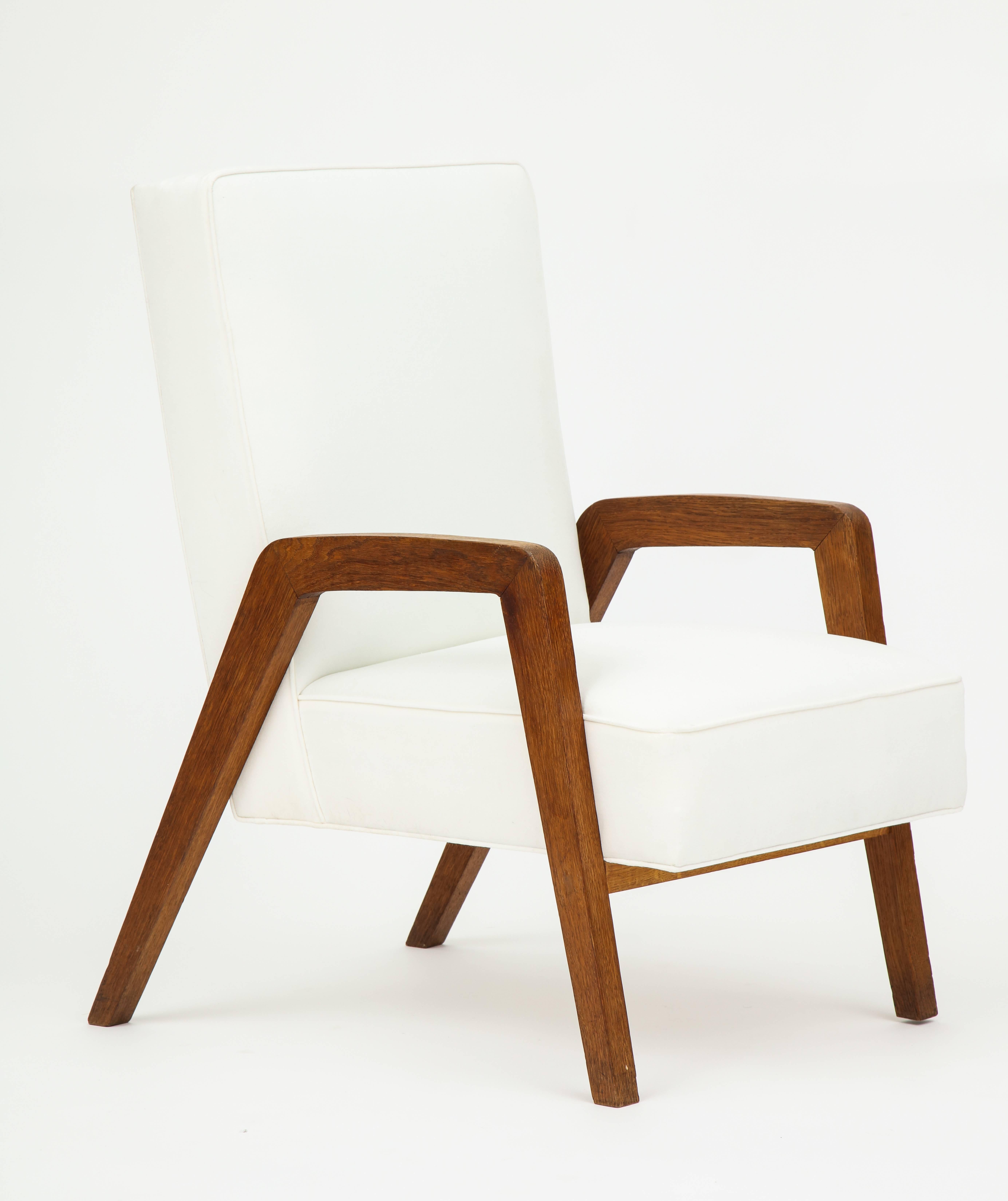 Midcentury Oak Velvet White Jeanneret Style Pair of Lounge Chairs France 1950s

Beautiful oak and velvet white lounge chairs with beautiful grain detail on the oak. The oak has the perfect amount of patina. Cool shape of the arms, reminiscent of