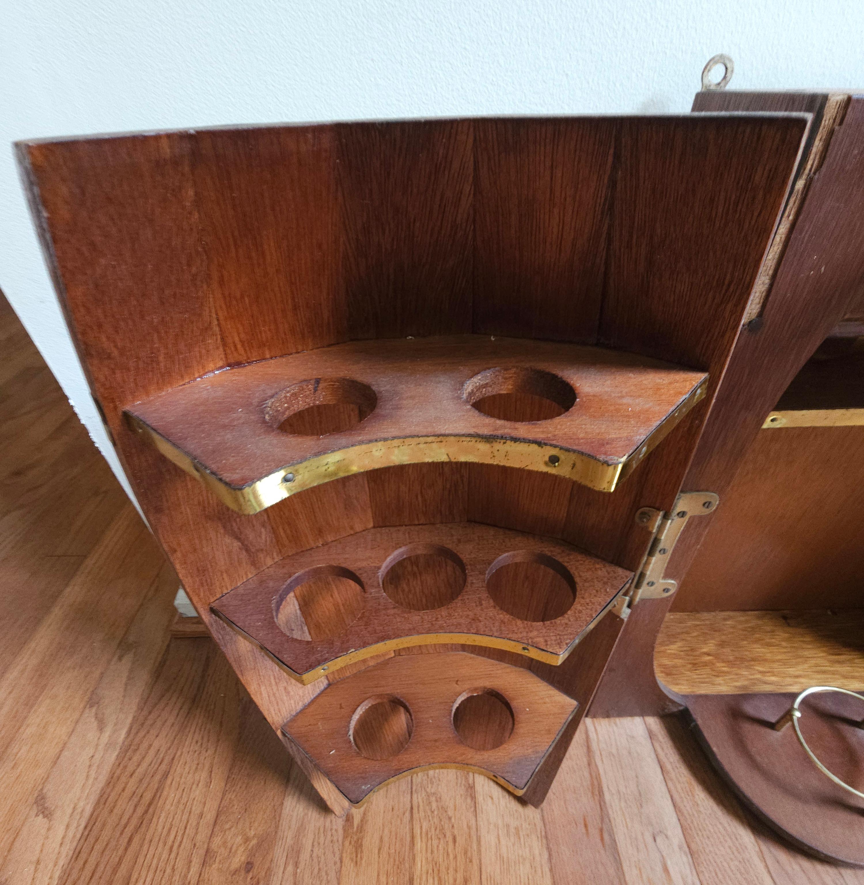 20th Century Mid-Century Oak Barrel Wall Hanging  Bar Cabinet with A Collection of 11 Glasses For Sale